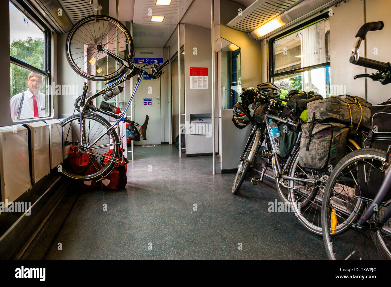 Bicycle compartment in Austrian train. Large bicycle compartment in ÖBB local train Stock Photo