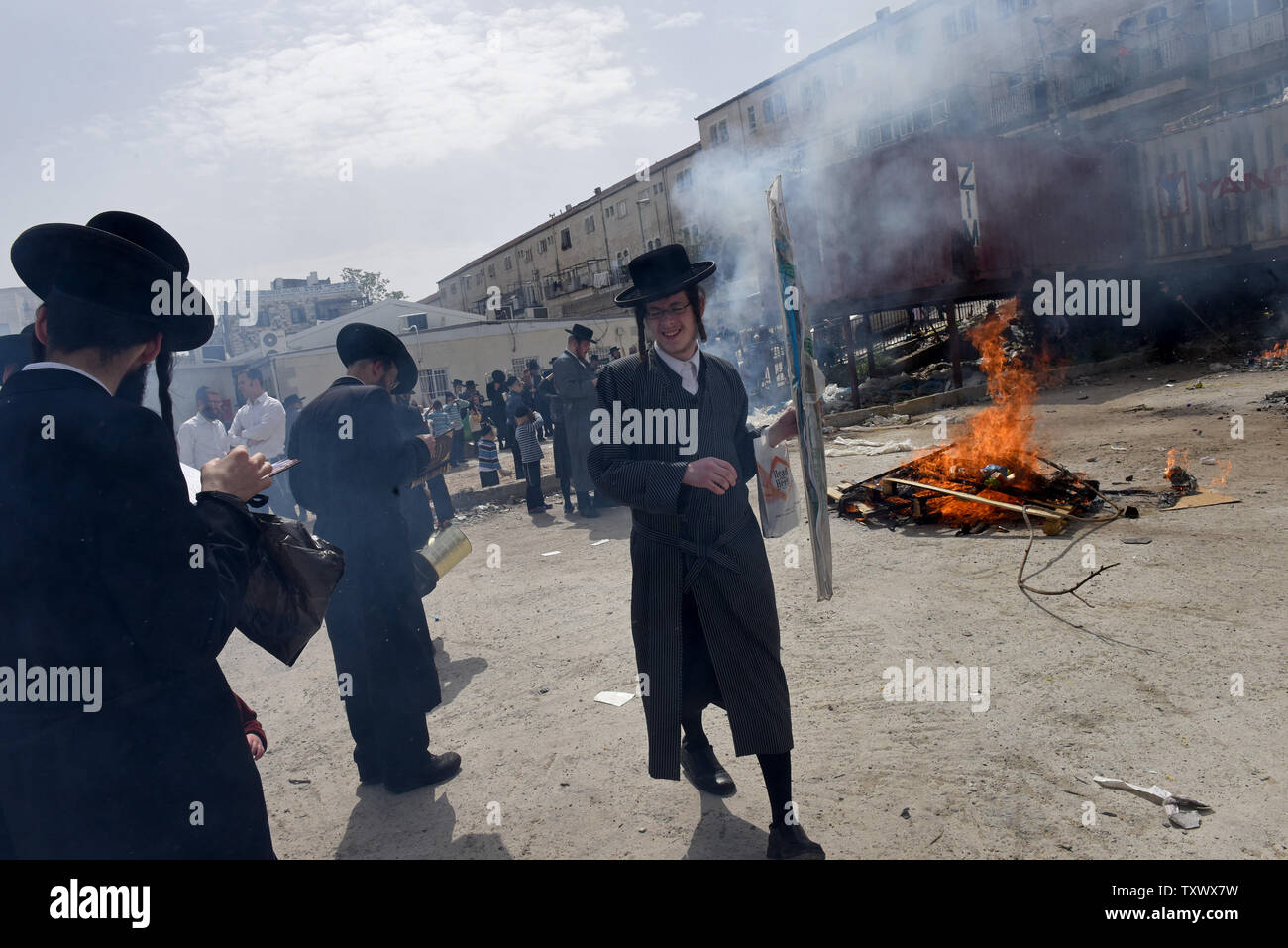 Ultra-Orthodox Jews burn leaven food products in preparation for the Jewish holiday of Passover in the Mea Shearim neighborhood in Jerusalem, Israel, April 10, 2017. Jews eat matzah, unleavened bread, during the eight days of Passover that celebrates the Biblical story of the exodus of the Israelites from slavery in Egypt.  Photo by Debbie Hill/UPI Stock Photo