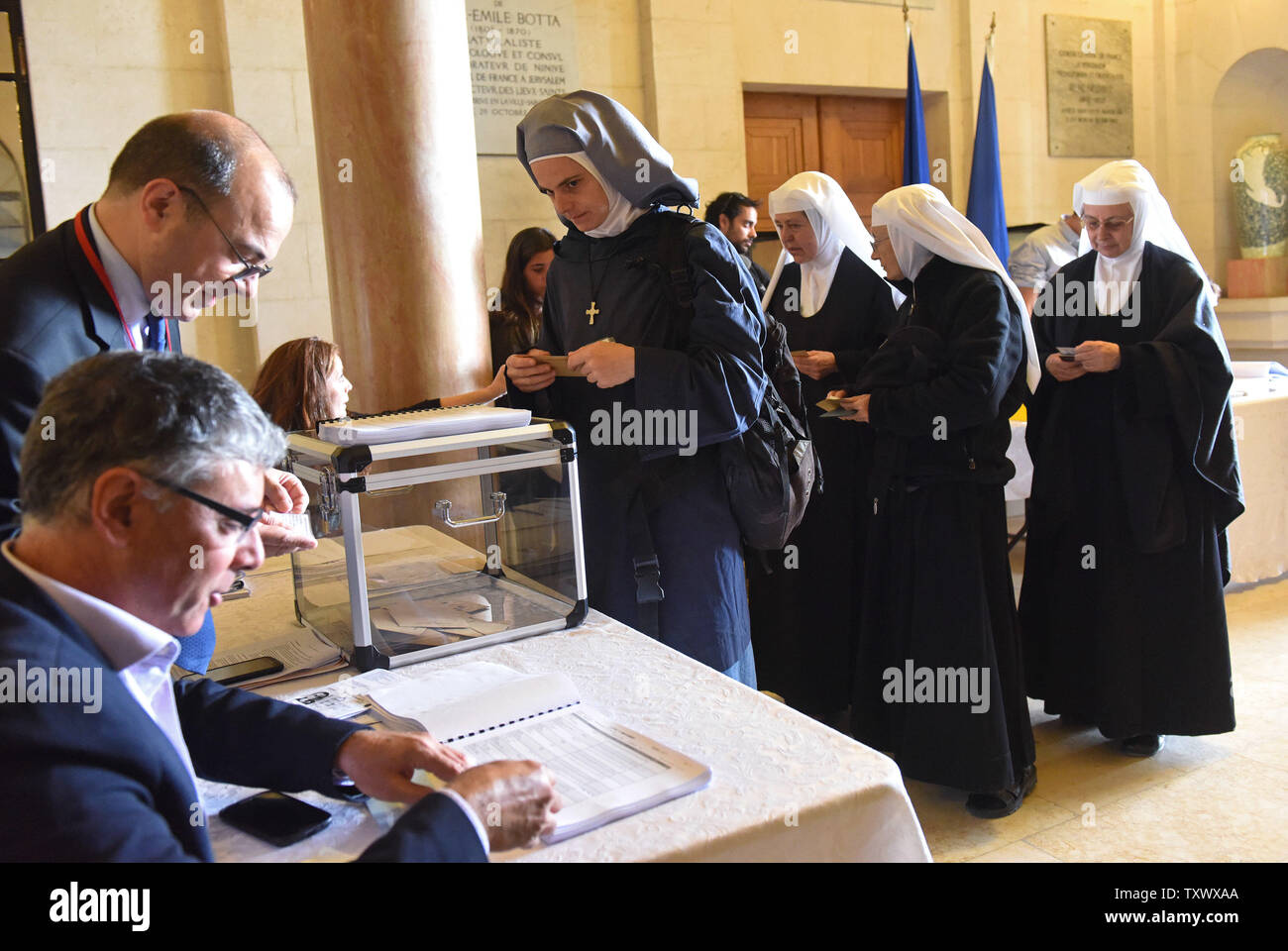 French nuns,living in Israel, wait to cast their votes in the French presidential election in the French Consulate in Jerusalem, Israel, April 23, 2017. Approximately two million French citizens live abroad and make up 2% of all French voters. Photo by Debbie Hill/UPI Stock Photo