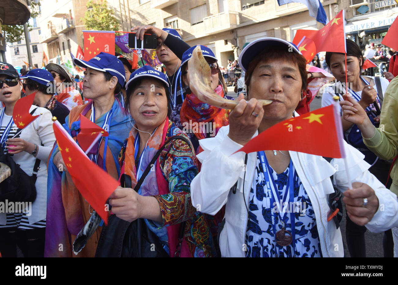 Pro-Israel Christians wave the Chinese flag in the annual Jerusalem March during the Sukkot, or Feast of the Tabernacles, Jewish holiday in Jerusalem, Israel, October 10, 2017. Over 6,000 Christians from more than 90 nations have come to Israel to celebrate Israel's 50th anniversary of the reunification of Jerusalem in the Six-Day War in 1967.    Photo by Debbie Hill/UPI Stock Photo