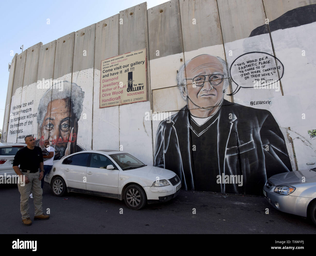 Graffiti of Curb Your Enthusiasm actor Larry David is seen on the Israeli separation wall by Austrian artist LUSHSUX, in Bethlehem, West Bank, October 18, 2017. LUSHSUX's followers on Twitter suggested he use a quote by Bernie Saunders since David played him on SNL. Photo by Debbie Hill/UPI Stock Photo
