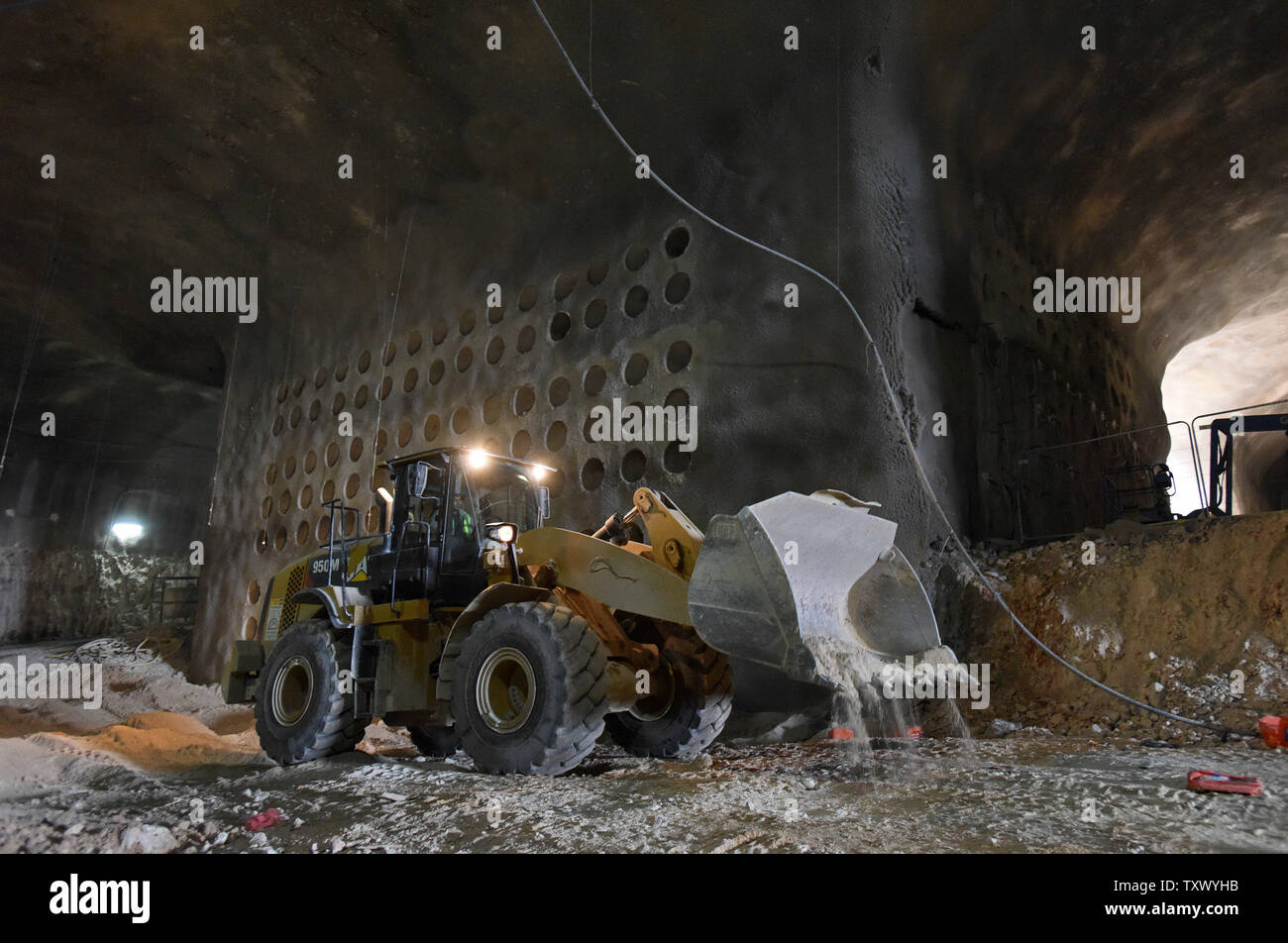 Heavy equipment moves past partially constructed catacomb burial plots in the underground burial tunnels at the Givat Shaul Cemetery, Har HaMenuchot, in Jerusalem, Israel, November 26, 2017.  Due to overcrowding and lack of land for burial sites in Jerusalem, the religious burial society called Chevra Kadisha, is building the massive underground burial site that will provide space for more than 22,000 graves.   Photo by Debbie Hill/UPI Stock Photo