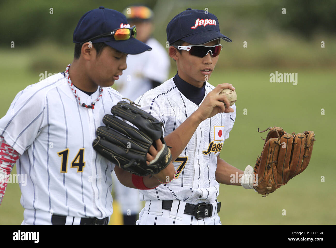 (L-R) Japan's Kohei Fujishita and Kaito Seike before their first game against Los Lomas Potros during the McHenry County Youth Sports Association's 23rd annual 15-Year-Old International Championship on August 1, 2015 in Crystal Lake, Illinois.  Japan lost to Los Lomas Potros 6-4 in their first game but defeated them 3-2 in their second game to win the championship.. Photo by John Konstantaras/UPI Stock Photo