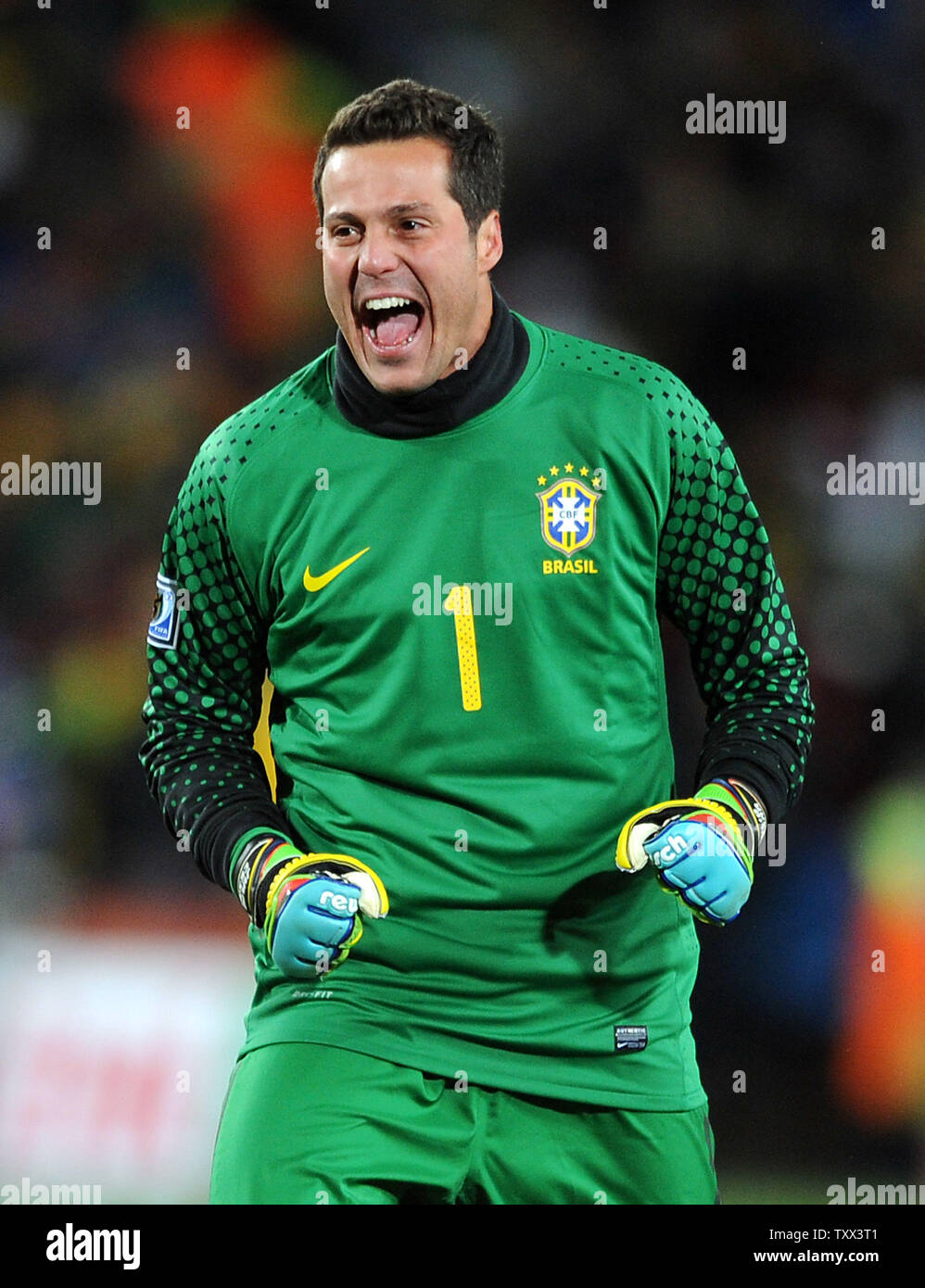 Julio Cesar of Brazil celebrates his side's opening goal during the Group E match at Ellis Park in Johannesburg, South Africa on June 15, 2010. UPI/Chris Brunskill Stock Photo