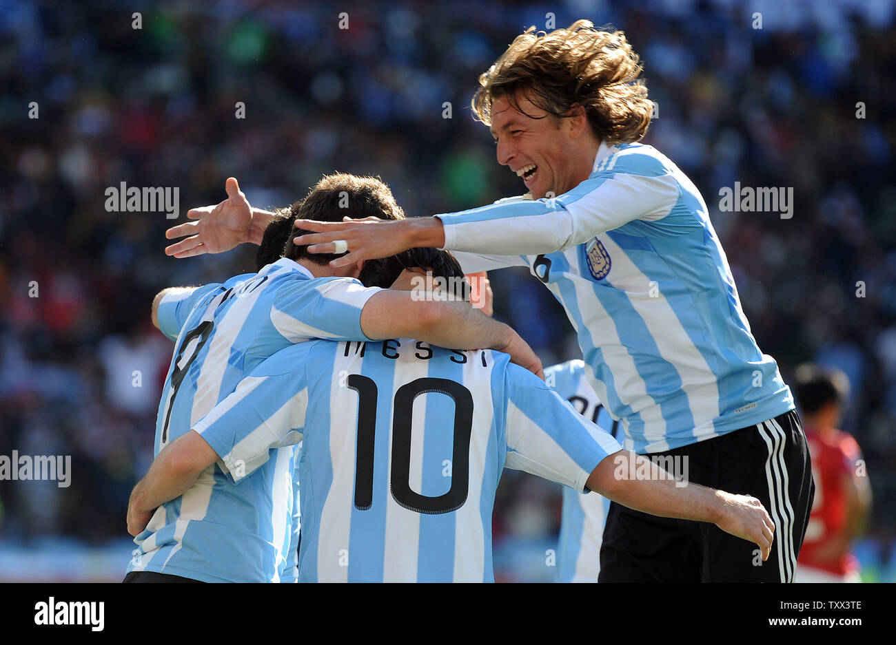 Gonzalo Higuain of Argentina is mobbed by his team-mates after scoring his side's third goal during the Group B match at Soccer City Stadium in Johannesburg, South Africa on June 17, 2010. UPI/Chris Brunskill Stock Photo