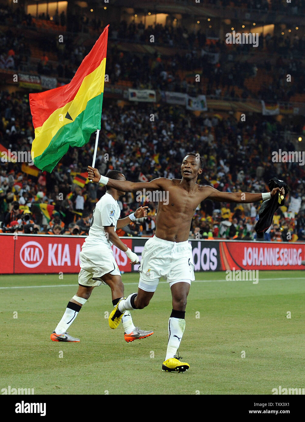 John Pantsil of Ghana celebrates qualification after the Group D match at Soccer City Stadium in Johannesburg, South Africa on June 23, 2010. UPI/Chris Brunskill Stock Photo