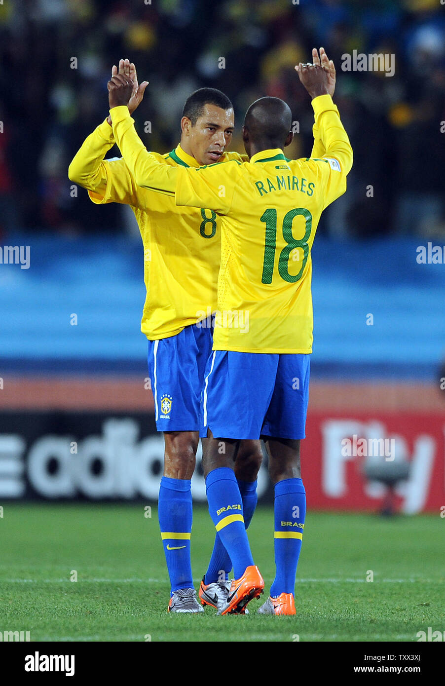 Gilberto Silva of Brazil celebrates his side's second goal with team-mate Ramires during the FIFA World Cup Round of 16 match at Ellis Park in Johannesburg, South Africa on June 28, 2010. UPI/Chris Brunskill Stock Photo