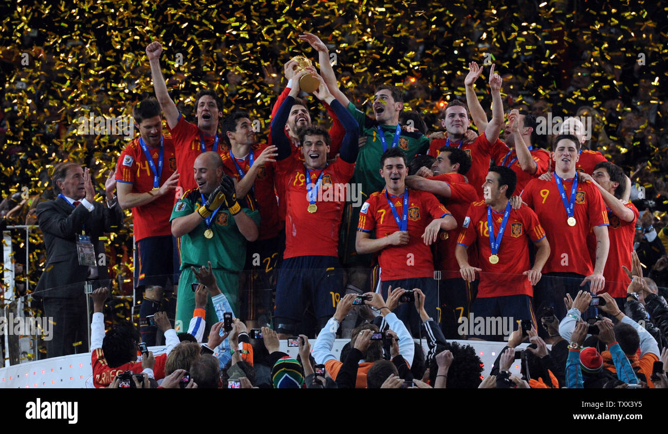 Spain lifts the World Cup following the FIFA World Cup Final match at Soccer City Stadium in Johannesburg, South Africa on July 11, 2010. Spain defeated Holland 1-0. UPI/Chris Brunskill Stock Photo