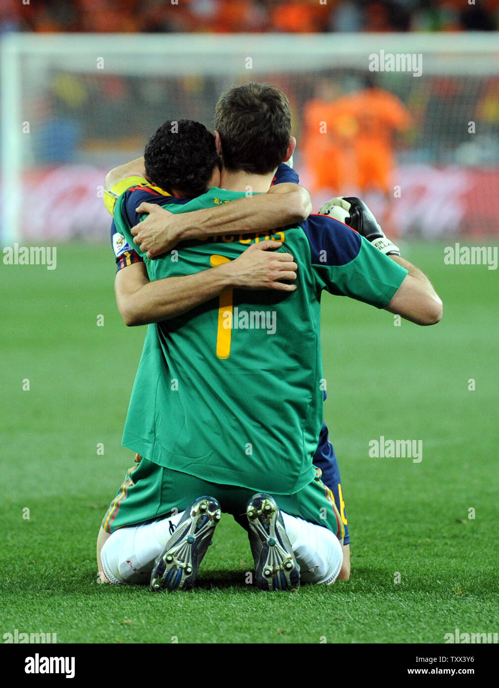 Iker Casillas of Spain celebrates with team-mate Sergio Busquets during the FIFA World Cup Final match at Soccer City Stadium in Johannesburg, South Africa on July 11, 2010. UPI/Chris Brunskill Stock Photo