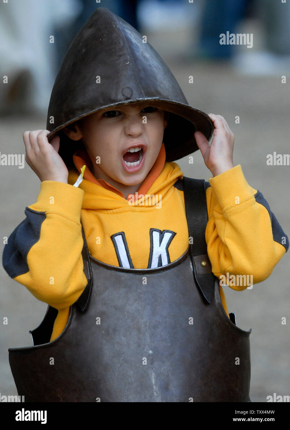 Nick Roadarmel, 3, of Gainesville, Virginia tries on colonial armor during a weapons demonstration on the 400th anniversary weekend, in Jamestown, Virginia on May 13, 2007. (UPI Photo/Kevin Dietsch) Stock Photo