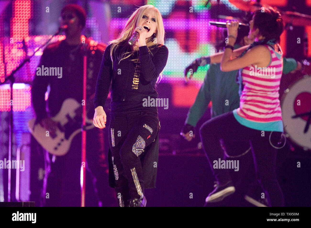 Singer Avril Lavigne performs on stage at the Penngrowth Saddledome in