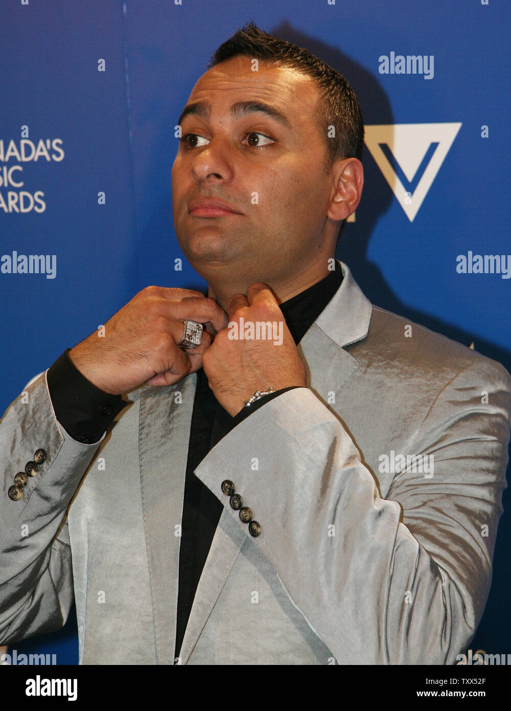 Juno Host and Comedian Russell Peters meets the press backstage after the 2008 JUNO Awards in Calgary, Alberta, April 6, 2008.  (UPI Photo/Peter Tanner) Stock Photo