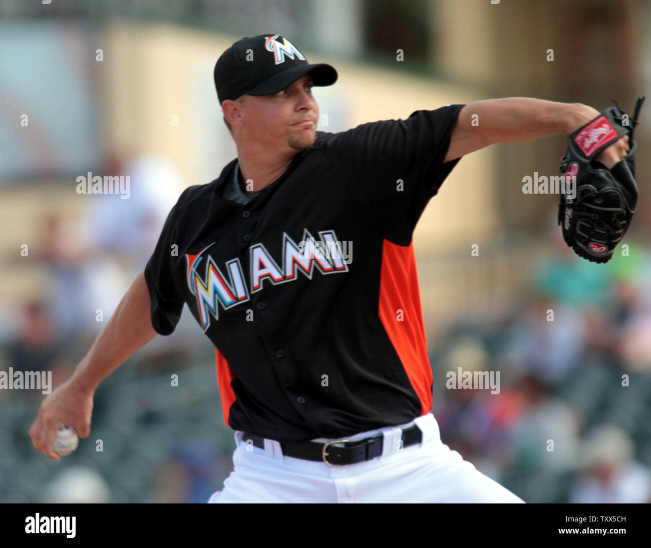 Miami Marlins pitcher Heath Bell throws to the New York Mets at the Roger  Dean Stadium in Jupiter, Florida on March 15, 2012. The Miami Marlins beat  the New York Mets 3-1.