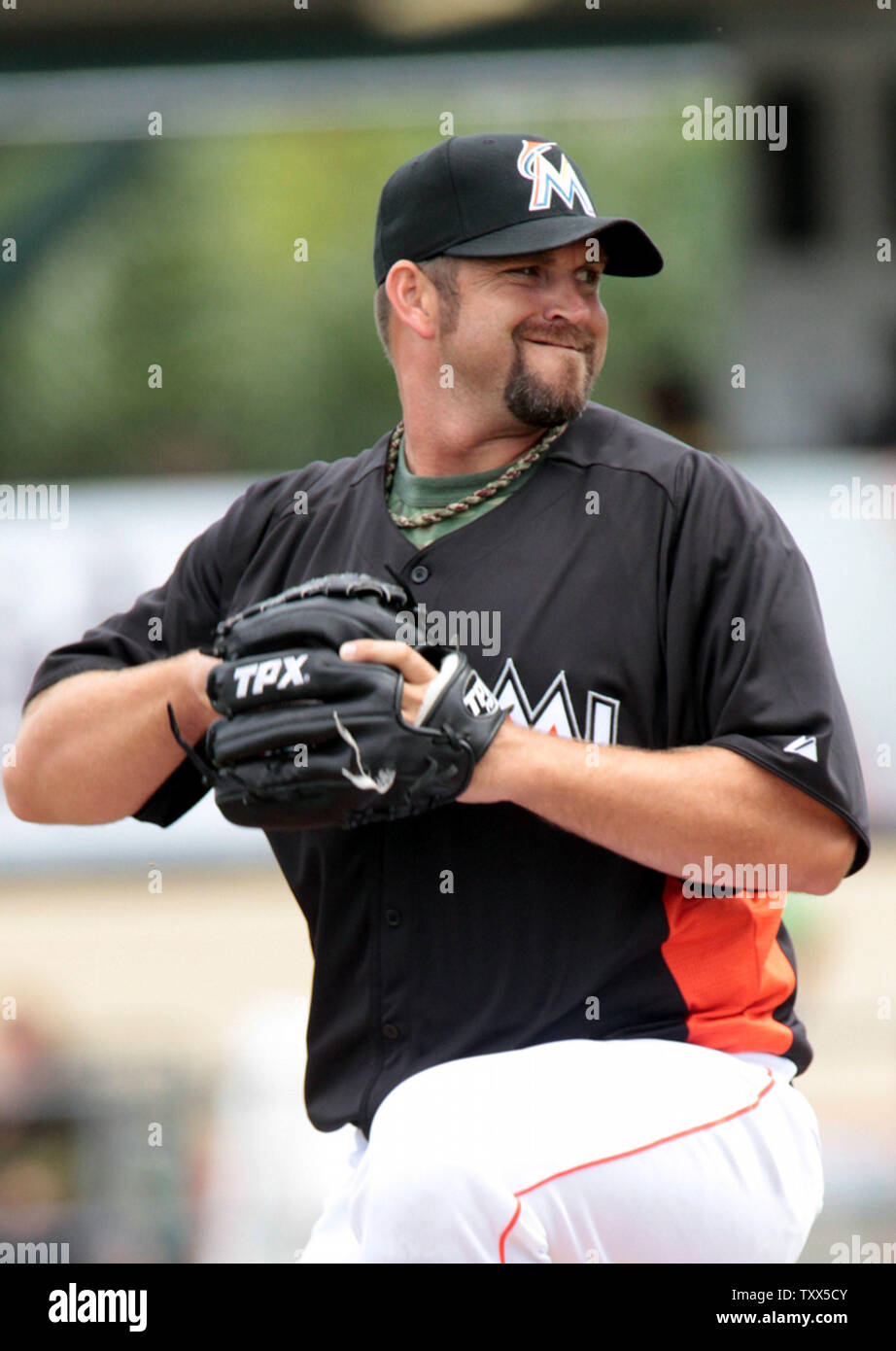 Miami Marlins pitcher Heath Bell throws to the New York Mets at the Roger  Dean Stadium in Jupiter, Florida on March 15, 2012. The Miami Marlins beat  the New York Mets 3-1.