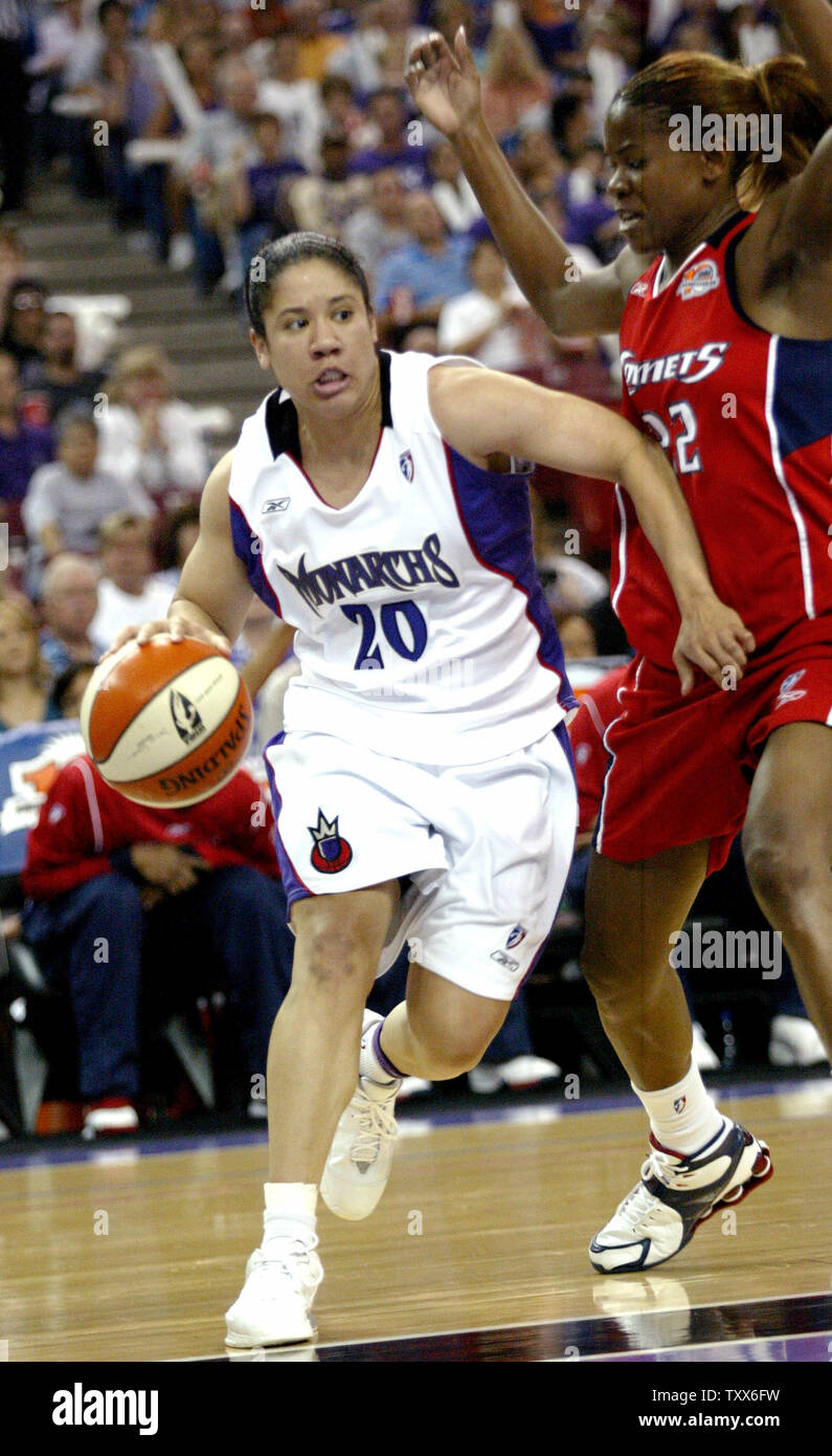 Houston Comets players Michelle Snow, left, and Sheryl Swoopes congratulate  each other after the Comets beat the Minnesota Lynx 77-73 in overtime in  Minneapolis, Friday Aug. 4, 2006. Swoopes led Houston with