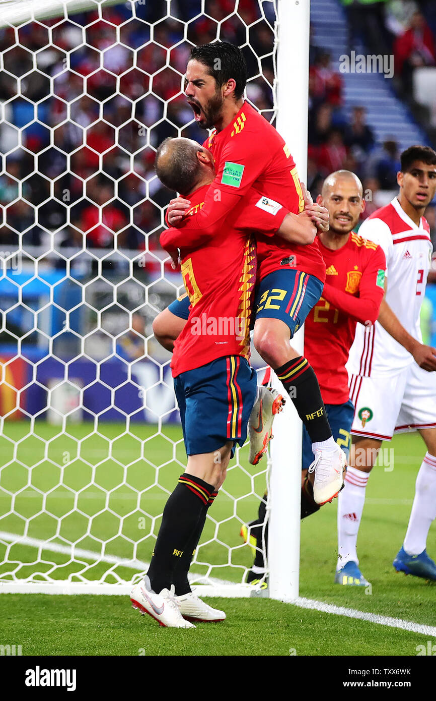 Isco of Spain celebrates scoring his side's first goal with team-mate Andres Iniesta (L) during the 2018 FIFA World Cup Group B match at Kaliningrad Stadium in Kaliningrad, Russia on June 25, 2018. The game finished in a 2-2 draw. Photo by Chris Brunskill/UPI Stock Photo