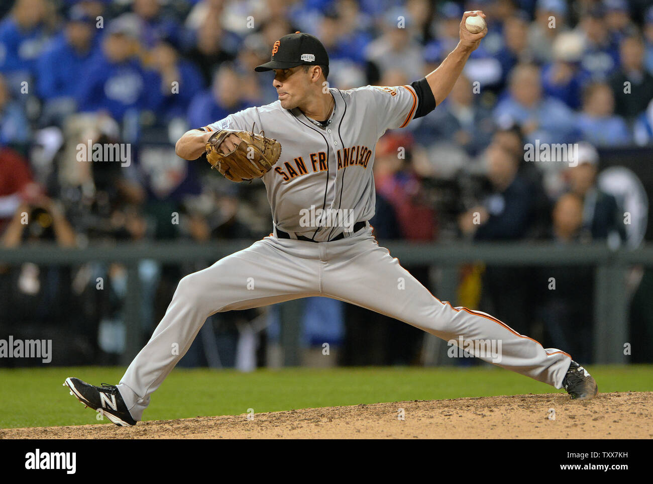 San Francisco Giants reliever Javier Lopez throws against the Kansas City Royals during the eighth inning of game 1 of the World Series at Kaufman Stadium in Kansas City, Missouri on October 21, 2014. UPI/Kevin Dietsch Stock Photo
