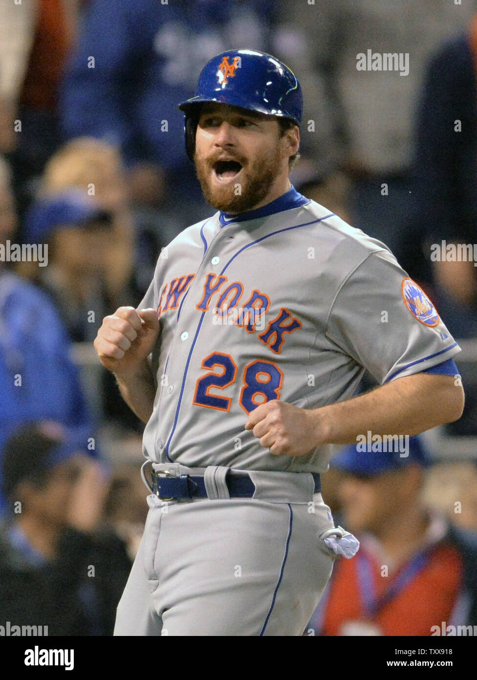 New York Mets Daniel Murphy (28) celebrates scoring on a single by Lucas  Duda against the Kansas City Royals in the fourth inning of game 2 of the World  Series at Kauffman