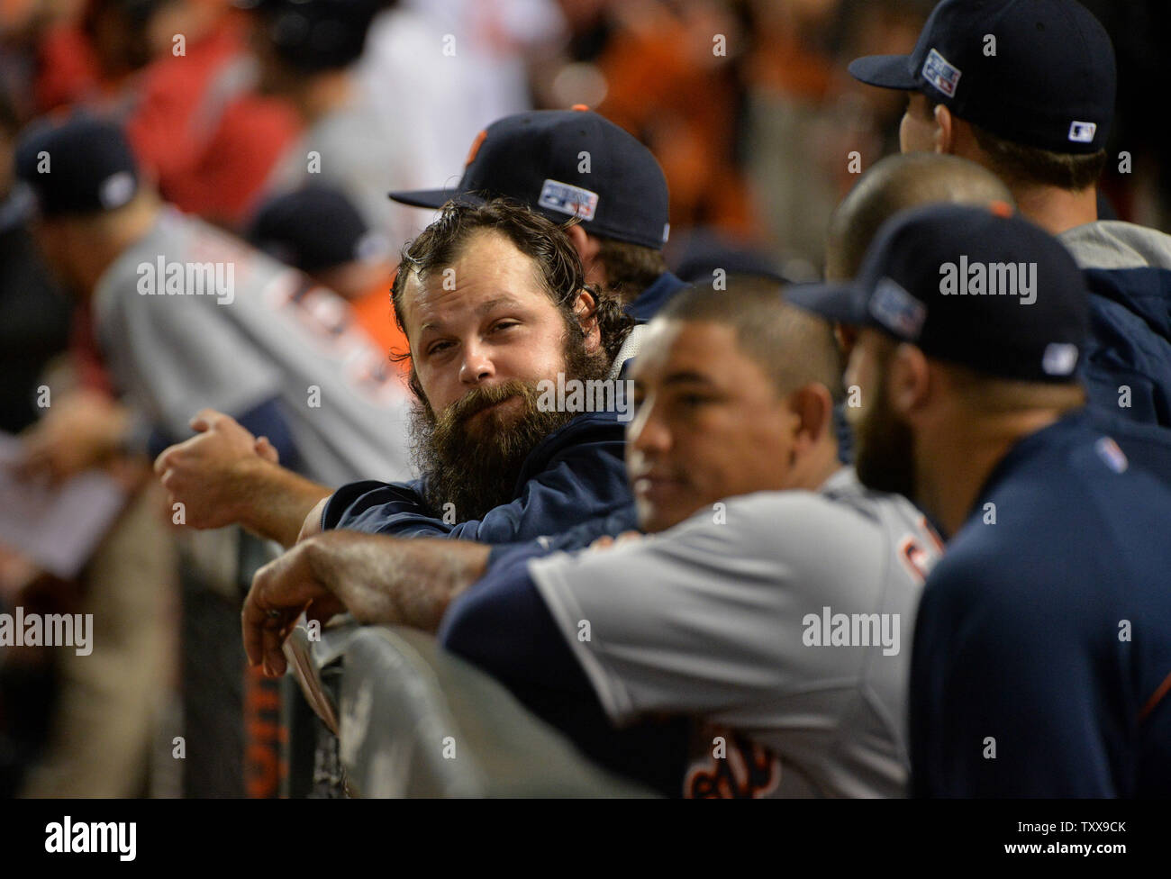 Detroit Tigers relief pitcher Joba Chamberlain and his teammates stand in the dugout during the ninth inning of game 1 of the American League Division Series against the Baltimore Orioles at Orioles Park at Camden Yards in Baltimore, Maryland on October 2, 2014.     UPI/Kevin Dietsch Stock Photo