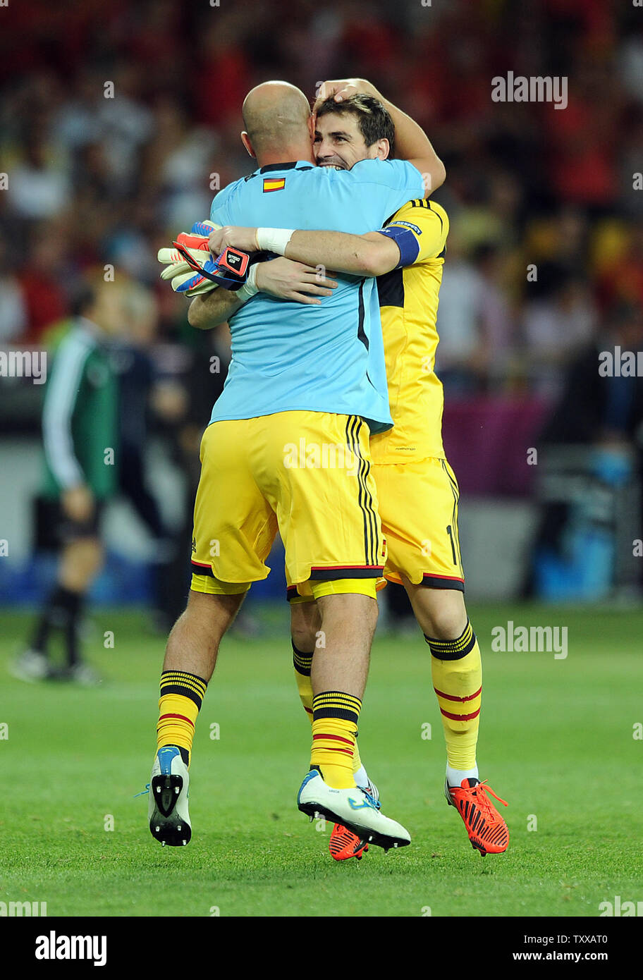 Iker Casillas of Spain (R) celebrates with team-mate Pepe Reina following the Euro 2012 Final match at the Olympic Stadium in Kiev, Ukraine on July 1, 2012.  Spain defeated Italy 4-0 to win the championship.   UPI/Chris Brunskill Stock Photo