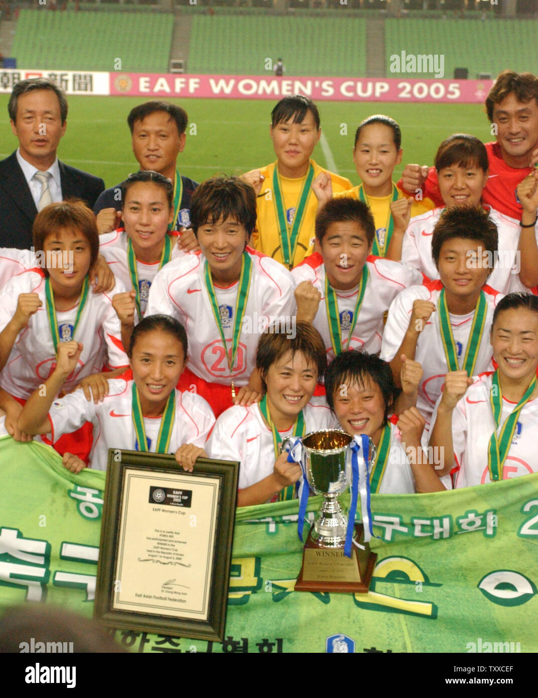 South Korean Women's Team players pose for camera after the closing ceremony of the EAFF Women's Cup 2005 at the Daegu World Cup Stadium, Daegu, South Korea on August 6, 2005. (UPI Photo/Keizo Mori) Stock Photo