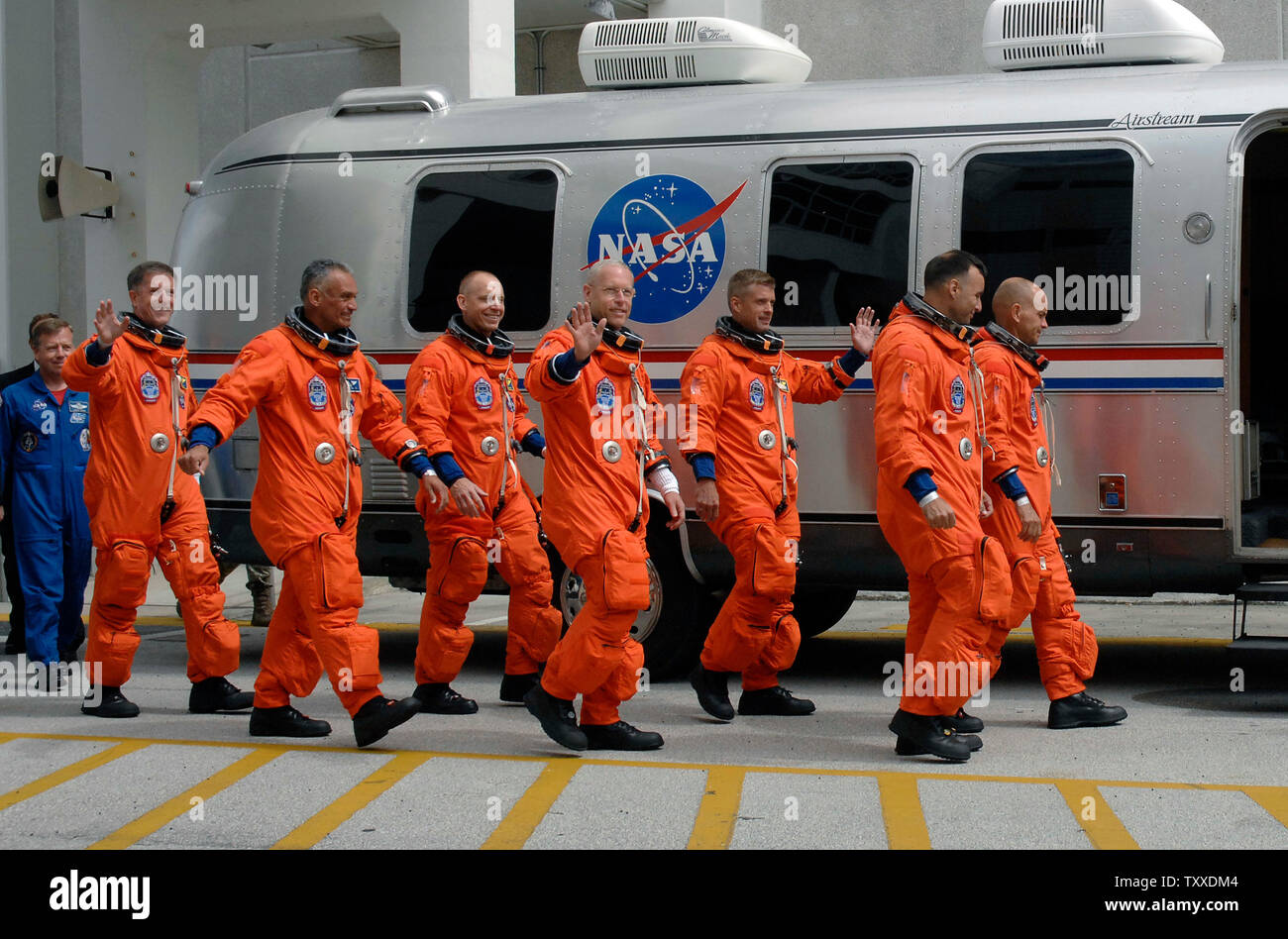 Commander Fred Sturckow (R), leading STS-117 crew members (R to L) Lee Archambault, Steven Swanson, Patrick Forrester, Clay Anderson, John Olivas and James Reilly walk out from the O&C Building at 3:45 PM at the Kennedy Space Center, Florida on June 8, 2007. NASA is making final preparations to launch the shuttle Atlantis at 7:38 PM. Atlantis will fly an eleven day mission to the International Space Station.(UPI Photo/Joe Marino-Bill Cantrell) Stock Photo