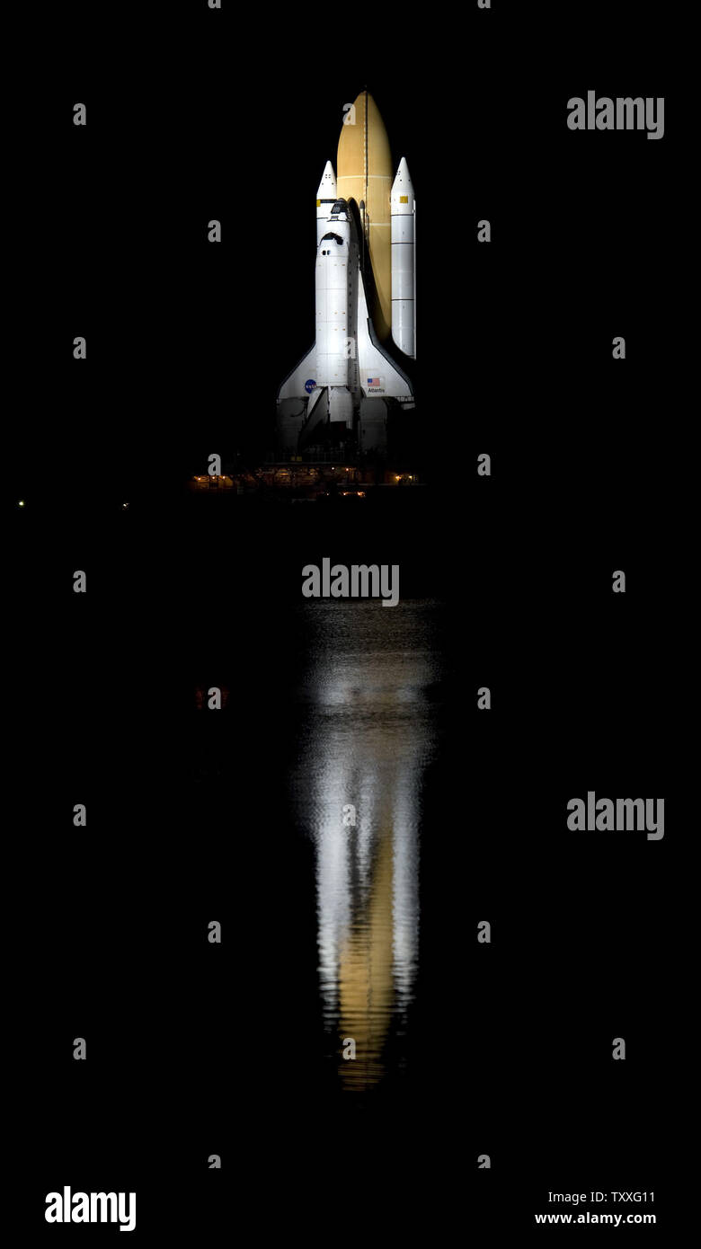 NASA's space shuttle 'Atlantis' rolls out to Launch Complex 39A at the Kennedy Space Center on April 21, 2010. The roll began at 11:32 PM. Atlantis is heading to Launch Complex 39A for its final mission, STS 132, which is currently scheduled for May 14, 2010. Atlantis will carry a crew of six and deliver the Russian Mini-Research Module to the to the International Space Station during a twelve day mission.       UPI/Joe Marino-Bill Cantrell Stock Photo