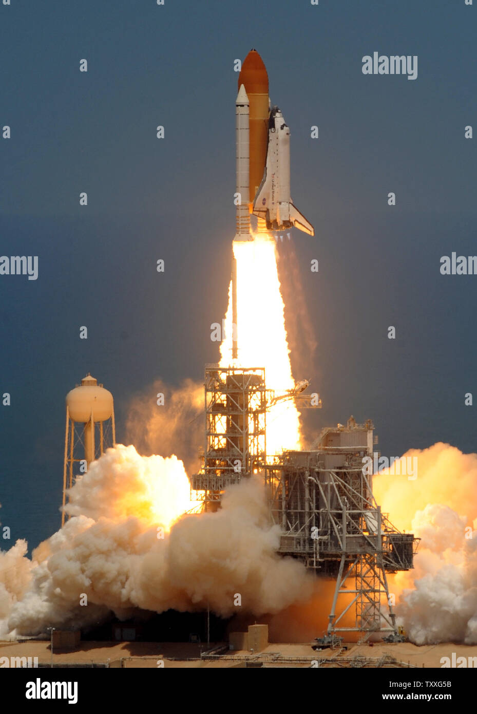 Space Shuttle Atlantis lifts off from launch pad 39A with a six-member ...