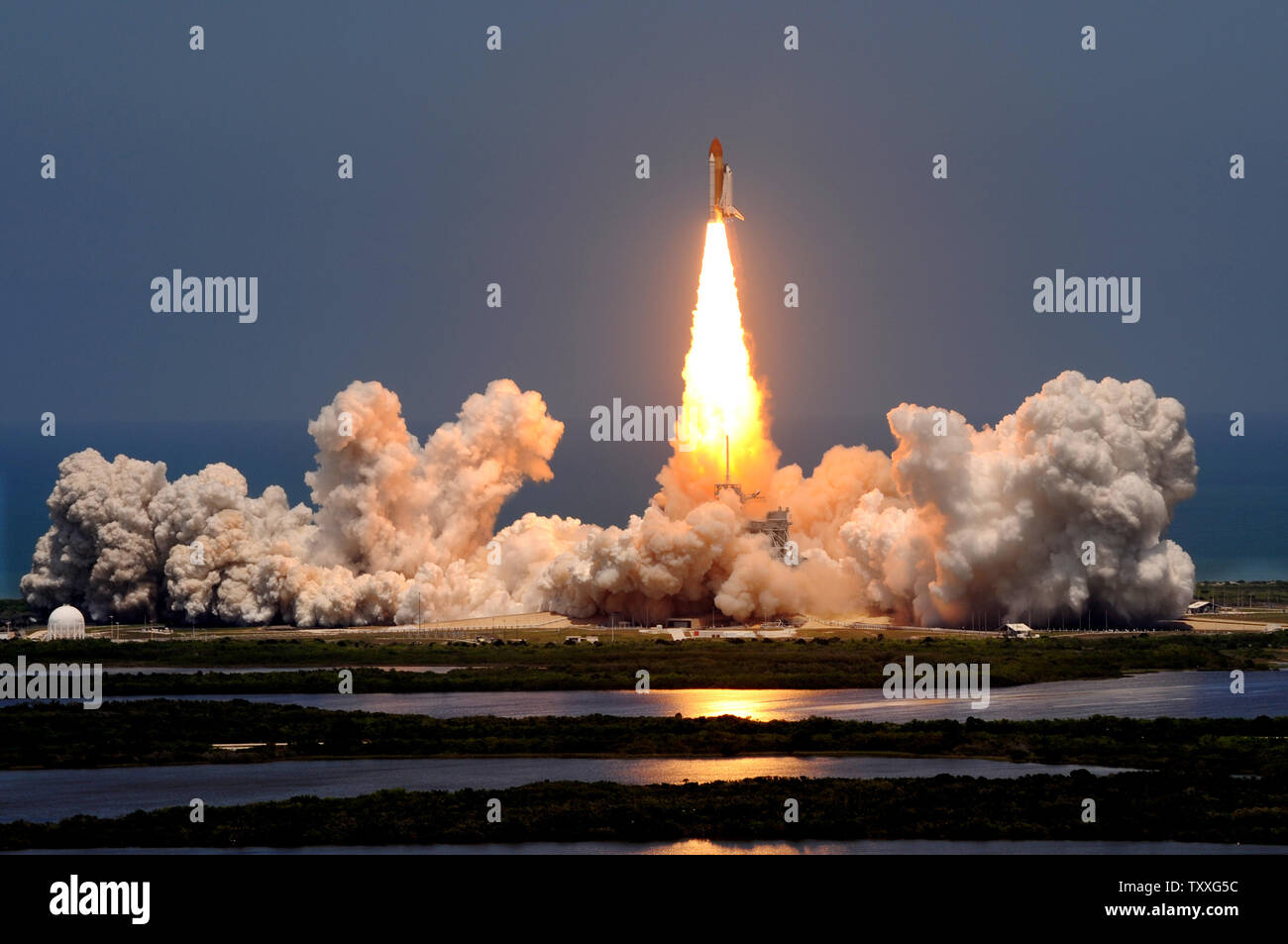 Space Shuttle Atlantis lifts off from launch pad 39A with a six-member ...