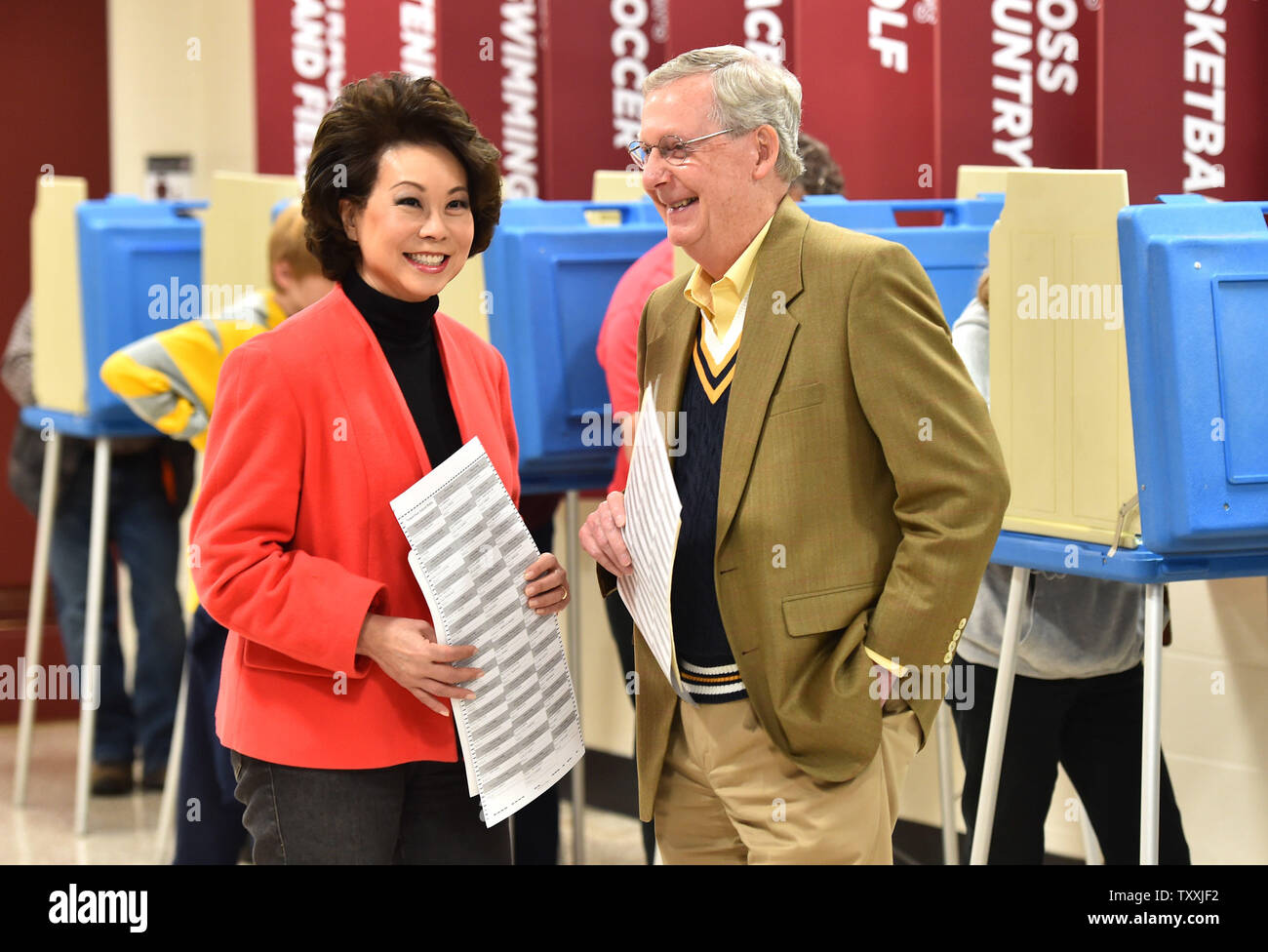 Senate Minority Leader Mitch McConnell, R-Ky, and his wife Elaine Chao prepare to cast his ballot on election day at Bellarmine University in Louisville, Kentucky on November 4, 2014.  UPI/Kevin Dietsch Stock Photo