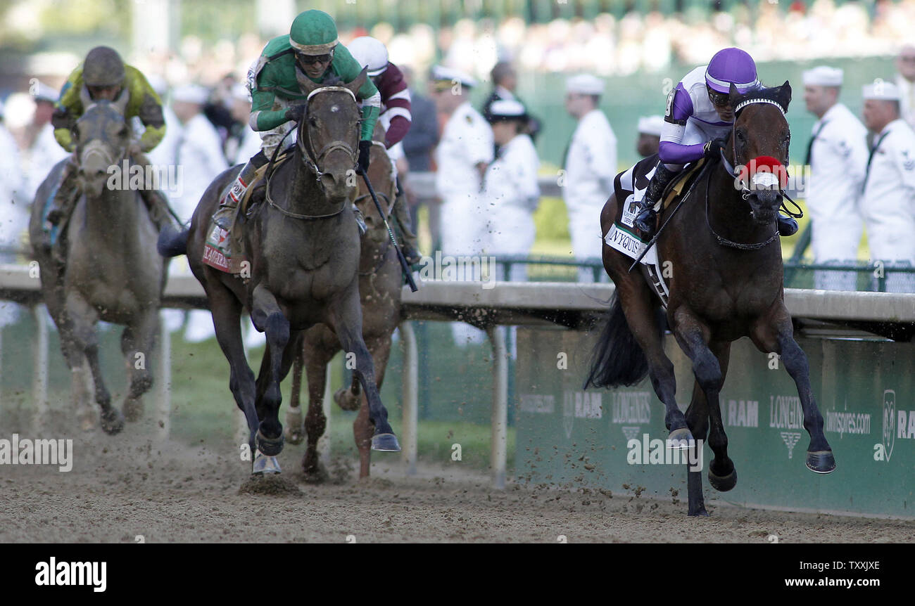 Mario Gutierrez, aboard Nyquist (R), leads Exaggerator to the finish line to win the 142nd running of the Kentucky Derby at Churchill Downs on May 7, 2016 in Louisville, Kentucky. XX held off 19 other horses to win the first leg of the Triple Crown.   Photo by Frank Polich/UPI Stock Photo