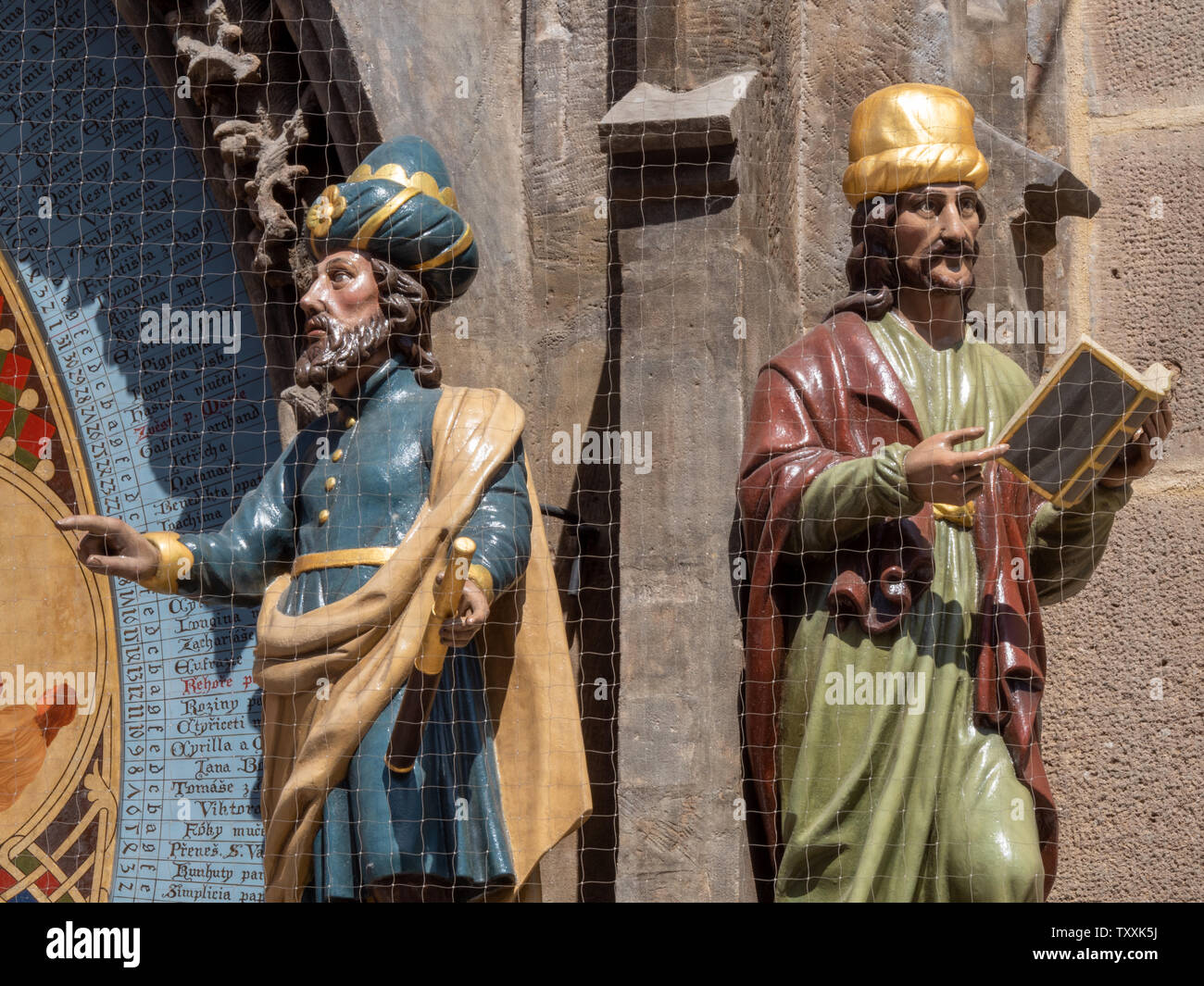 Astronomer and Chronicler Figures on the Astronomical Clock on the Old Town Hall in Old Town Square in Prague, Bohemia, Czech Republic - Famous Touris Stock Photo
