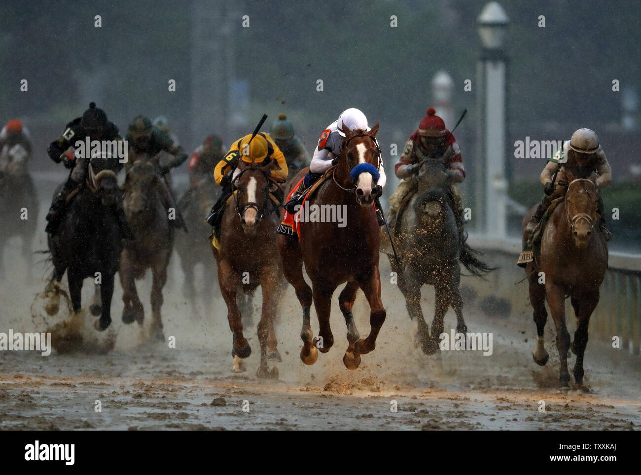 Jockey Mike Smith aboard Justify (C) crosses the finish line to win the 144th Running of the Kentucky Derby on May 5, 2018 at Churchill Downs in Louisville Kentucky. Photo by Jason Szenes/UPI Stock Photo