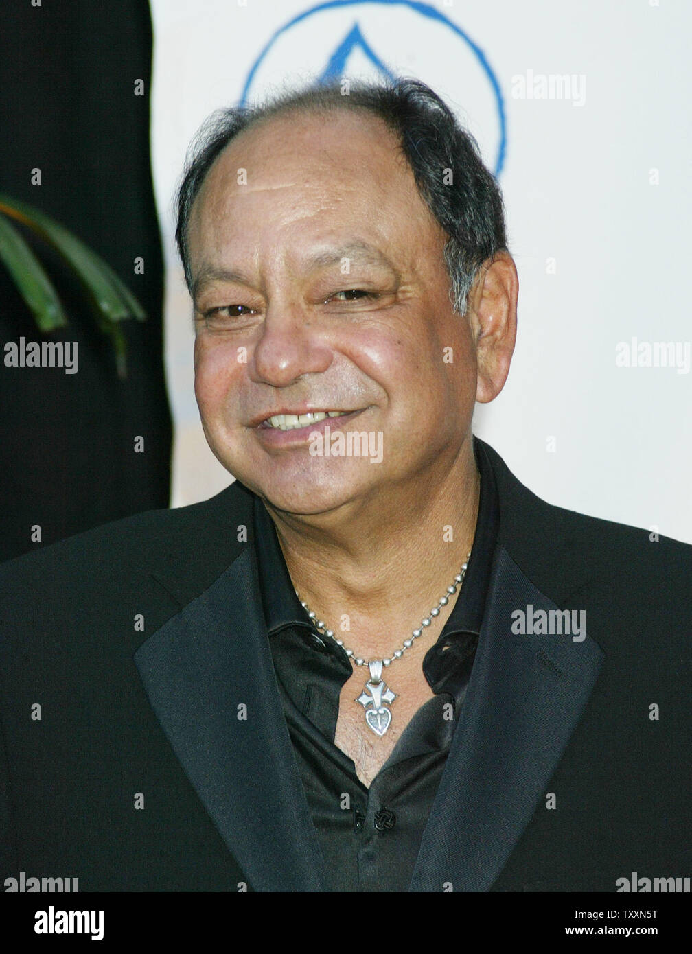 Actor Cheech Marin poses for photographers at the Latin Recording