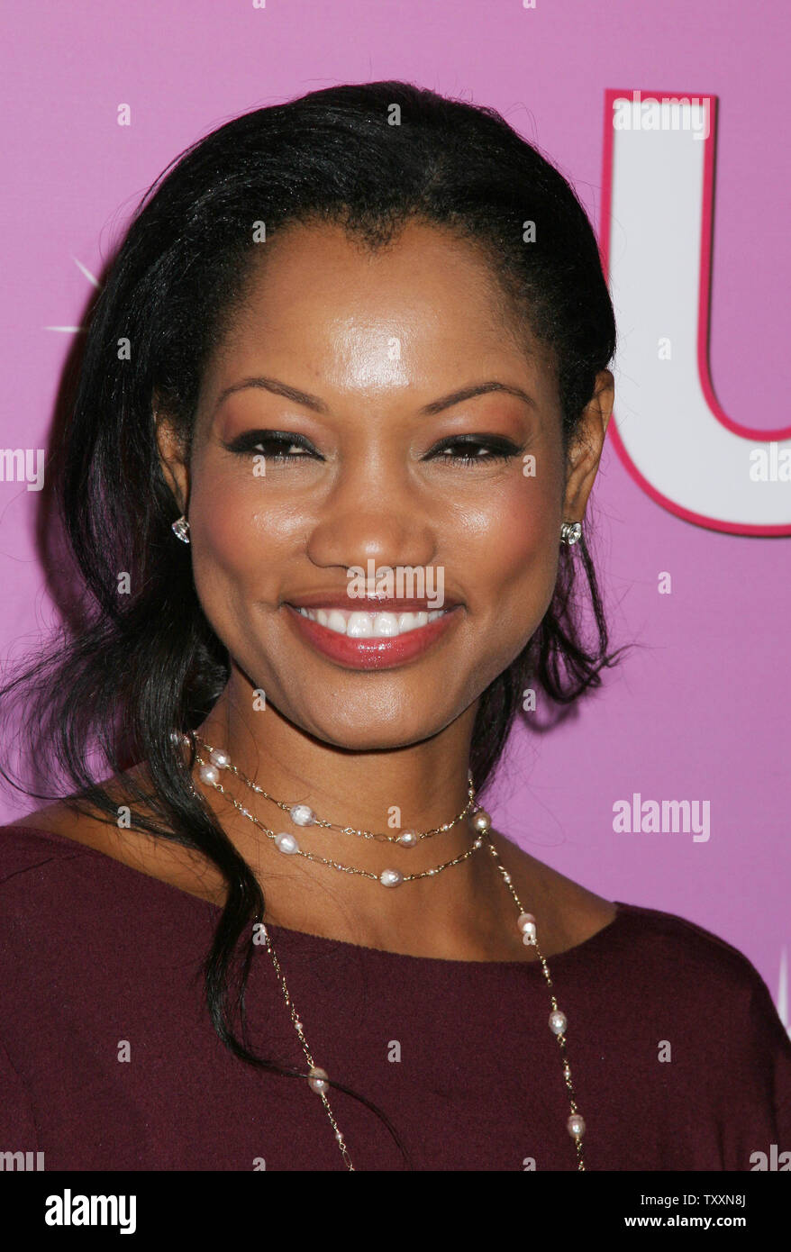 Actress Garcelle Beauvais poses for photographers at the Us Weekly Hot Young Hollywood Party at the Spider Club in Los Angeles, Sept. 17, 2004. (UPI Photo/Francis Specker) Stock Photo