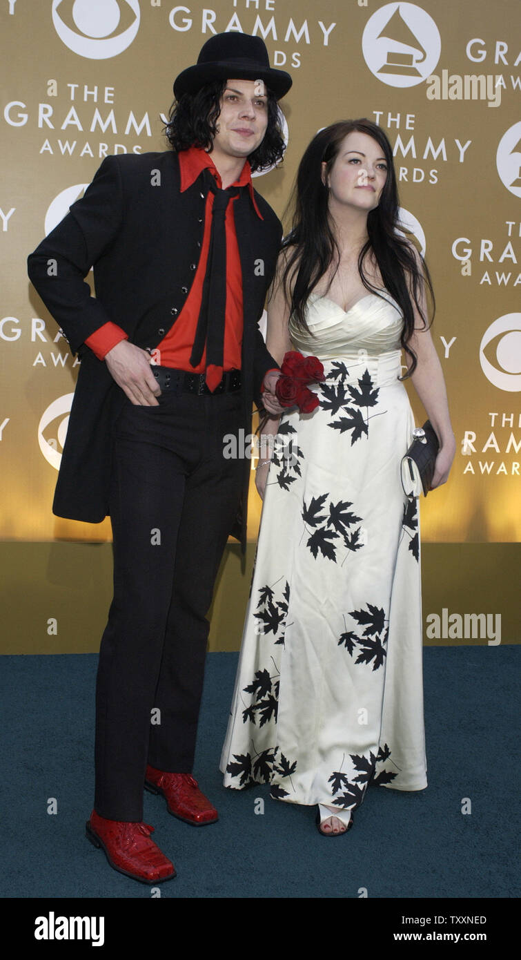 Jack White and Meg White of the White Stripes pose for photographers during the 46th Annual Grammy Awards, held at the Staples Center, February 8, 2004, in Los Angeles. (UPI Photo/Jim Ruyman) Stock Photo