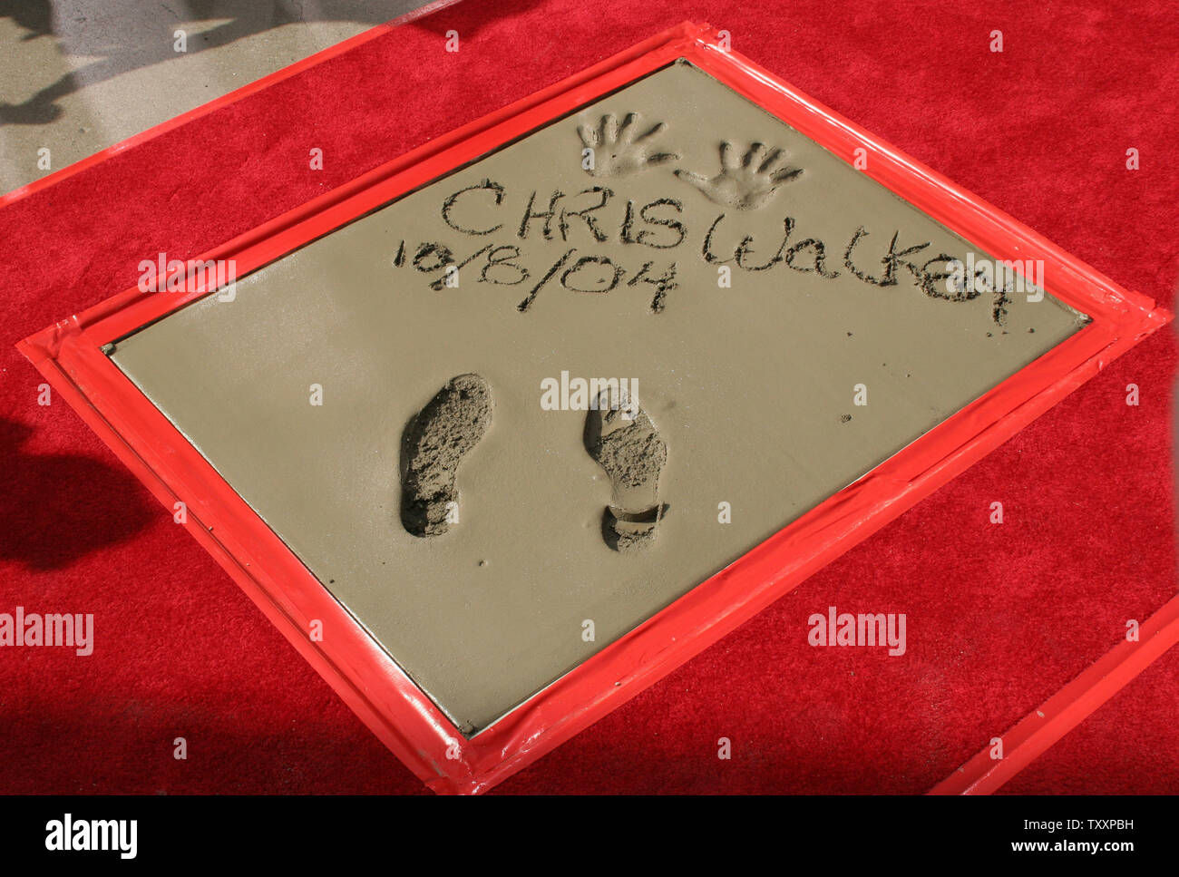 The cement imprint of actor Christopher Walken after the Legendary Hand & Footprints ceremony at Grauman's Chinese Theatre in Los Angeles, October 8, 2004. (UPI Photo/Francis Specker) Stock Photo