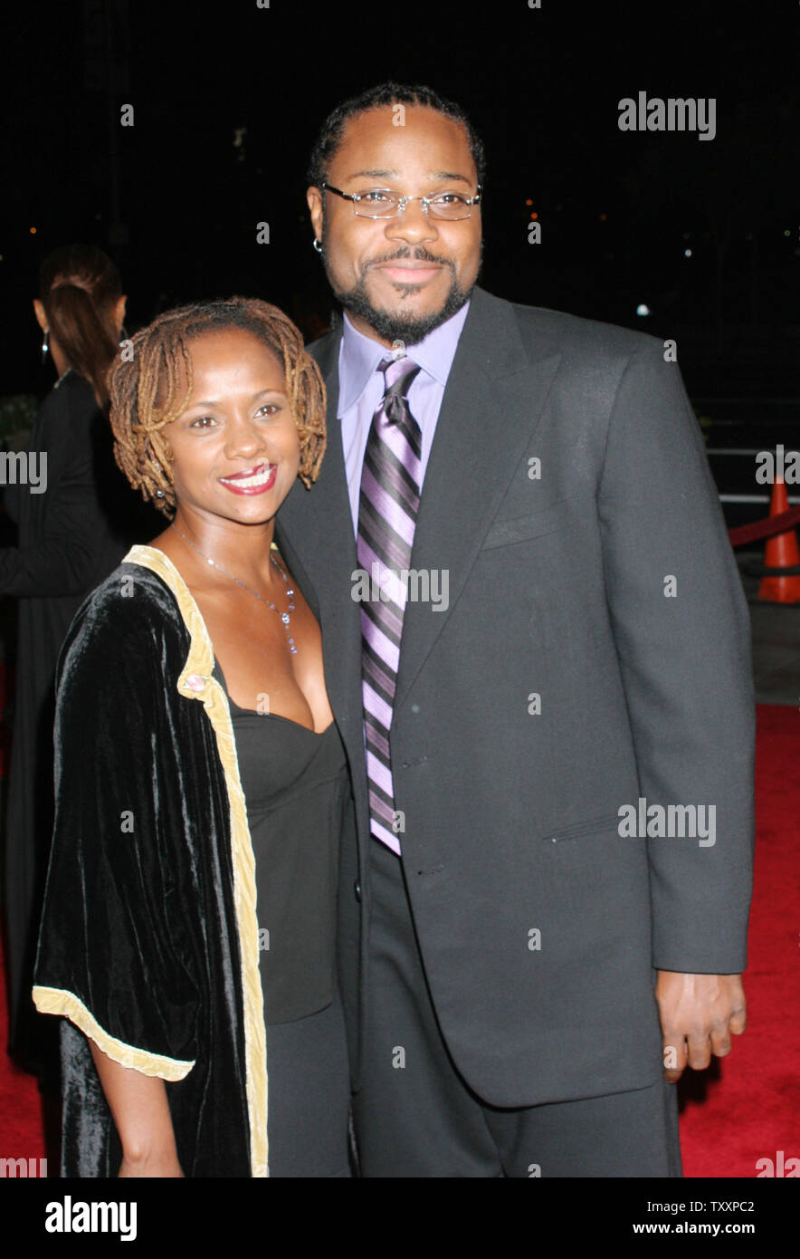 Actor MalcolmJamal Warner, right, and his wife, Karen, poses for