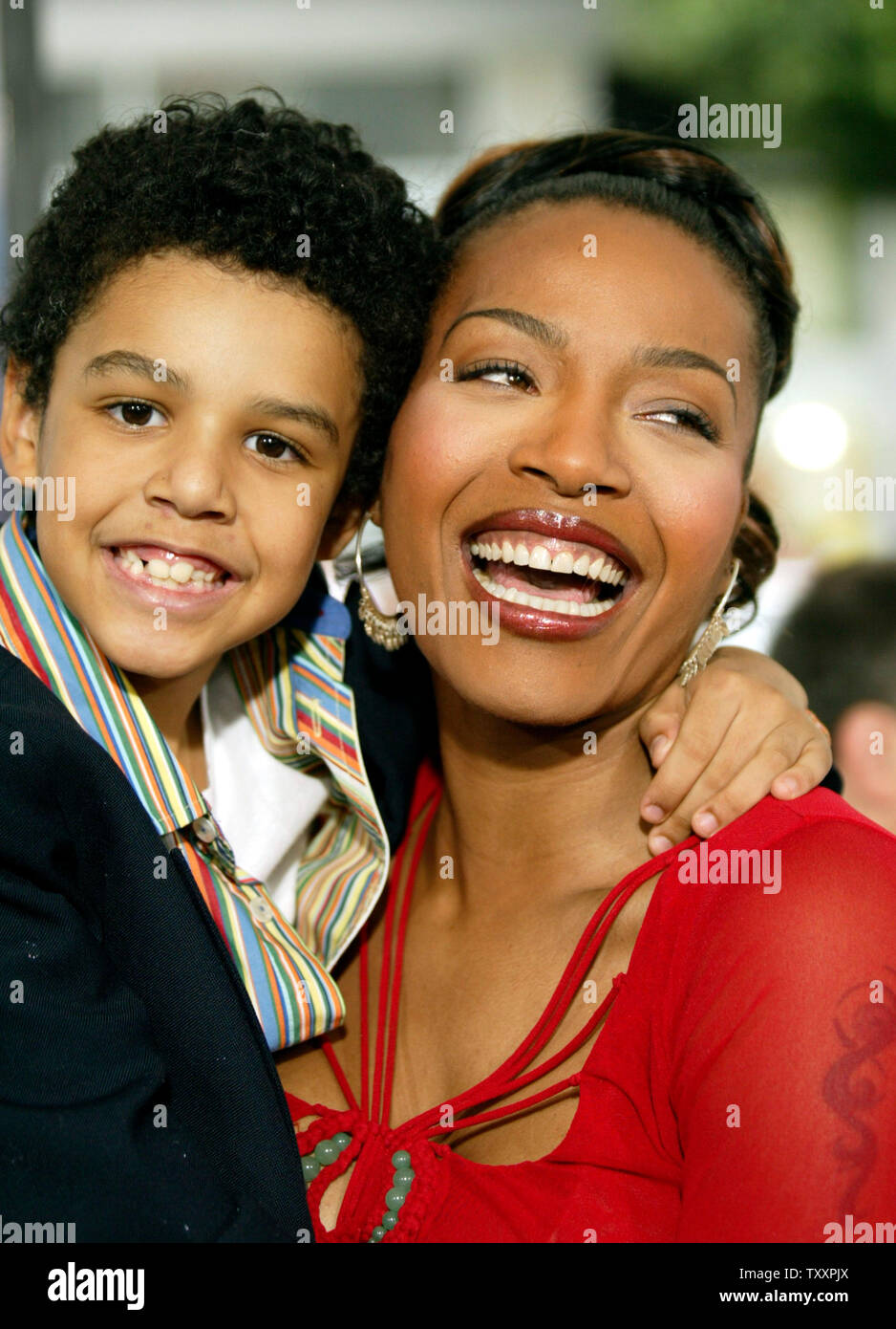 Actress and cast member Nona Gaye, right, and her son, Nolan,  pose for photographers at the November 7, 2004 Los Angeles  premiere of the new animated film 'Polar Express'. The film, starring Tom Hanks, is  based on the children's book of the same name and directed by Robert Zemeckis, opens in the United States November 10. (UPI Photo/Francis Specker) Stock Photo
