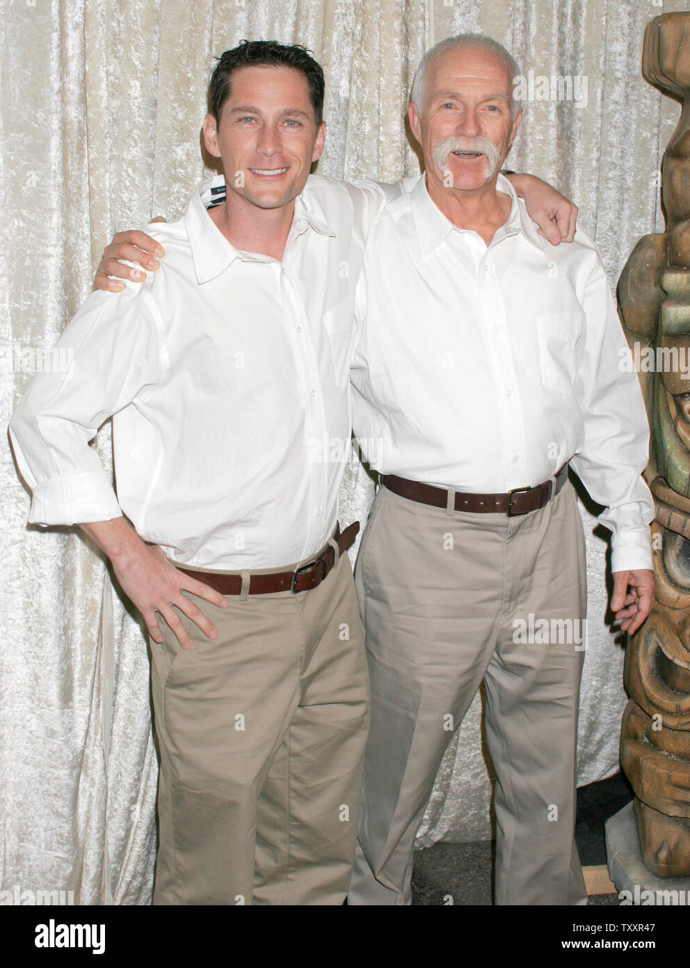 Eric Anderson, left, and Pat Abbott, who play the roles of professors, arrive at the cast party of a new reality series, 'The Real Gilligan's Island' at the Pearl night club  in Los Angeles,  November 30, 2004. (UPI Photo/Francis Specker) Stock Photo