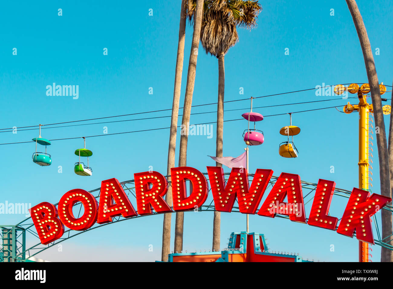 Vintage entrance marquee for the seaside boardwalk in Santa cruz, California, sunset, June 2015. Stock Photo