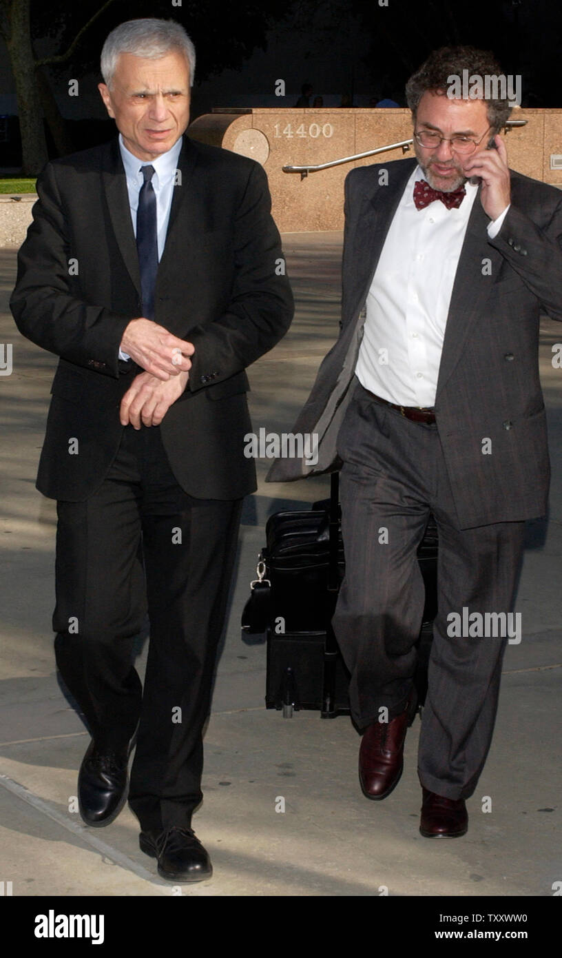 Actor Robert Blake (L) and his attorney M. Gerald Schwartzbach depart the Van Nuys courthouse after attending a court session in his murder trial, in Los Angeles March 15, 2005. Jurors in 'Baretta' star Robert Blake's murder trial continue after more than a week of deliberations without a verdict, increasing speculation they may deadlock over whether the actor shot and killed his wife outside his favorite restaurant.   (UPI Photo/Jim Ruymen) Stock Photo