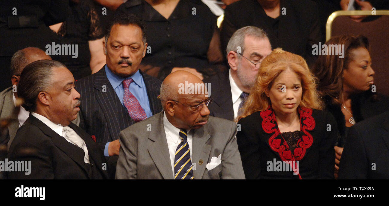 Rev. Al Sharpton, Rev. Jesse Jackson. civil rights attorney Connie Rice, sister of Sec. of State Condoleezza Rice anf TV personality Star Jones (L-R) attend funeral services for attorney Johnnie L. Cochran Jr. at the West Angeles Cathedral in Los Angeles April 6, 2005.Colorful and eloquent, Cochran became a legal superstar after helping clear O. J. Simpson during a sensational murder trial in which he uttered the famous quote, 'If it doesn't fit, you must acquit,' a reference to a glove found at the murder scene. (UPI Photo/Jim Ruymen) Stock Photo