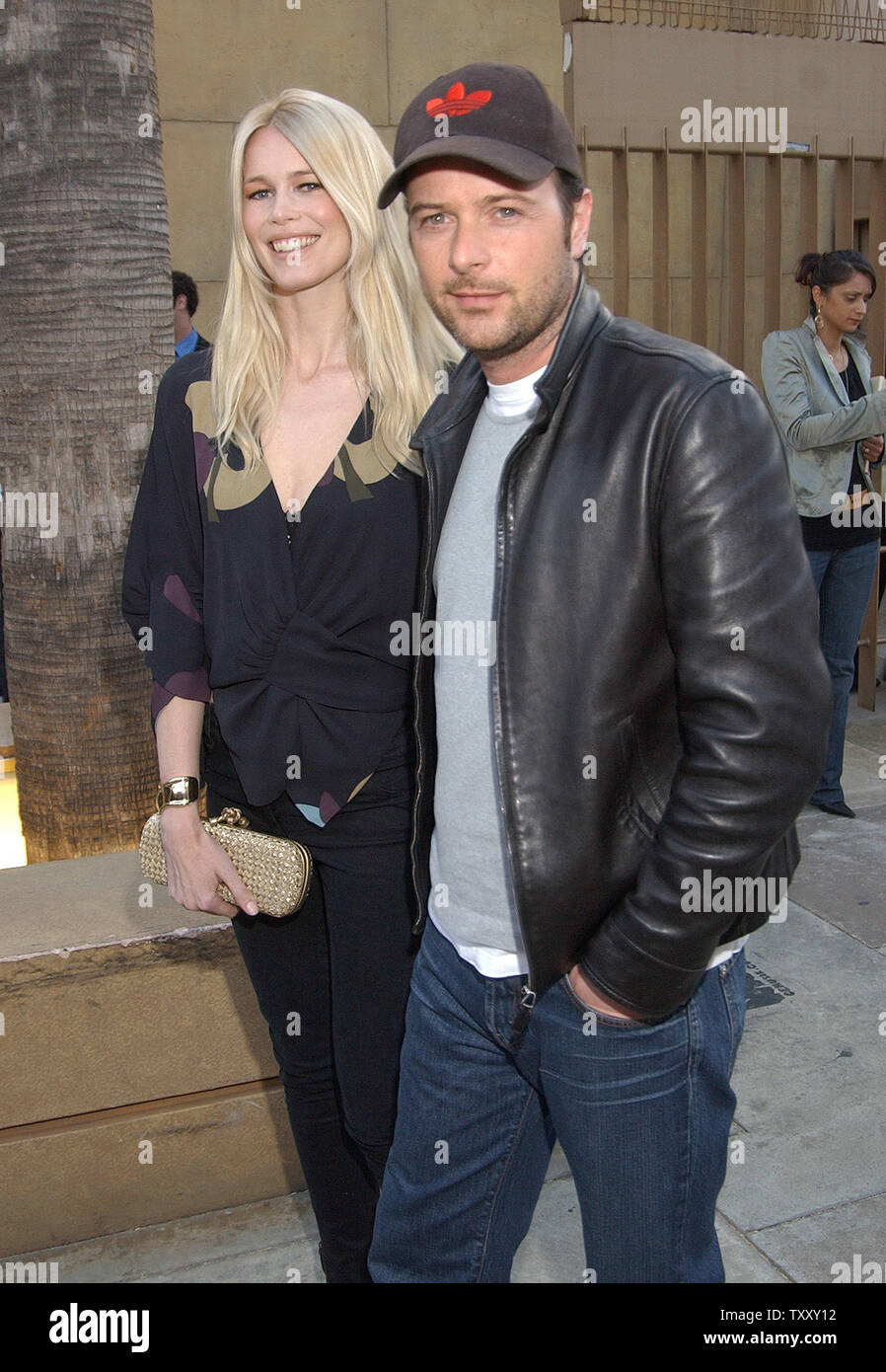 German model-actress Claudia Schiffer and her husband director-producer Matthew Vaughn arrive at the premiere of 'Layer Cake' May 2, 2005, in Los Angeles.  (UPI Photo/John Hayes) Stock Photo