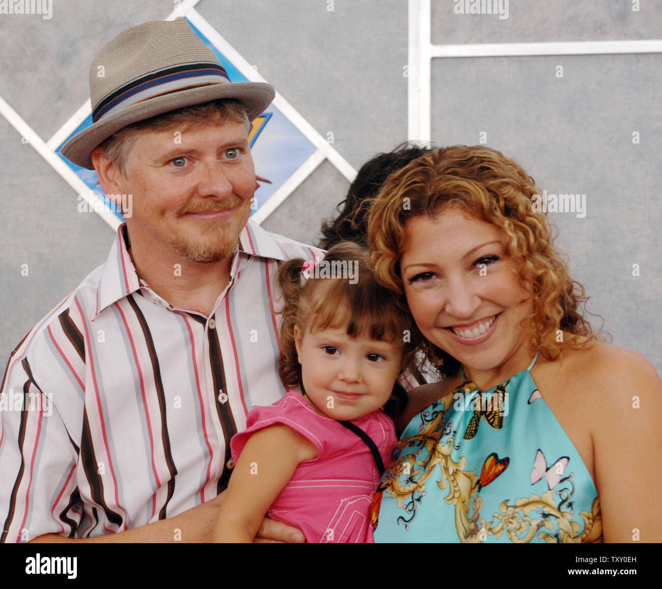 Actor Dave Foley (L), a cast member in the comedy adventure motion picture 'Sky High,' arrives with his wife Crissy and their 2-year-old daughter Alina at the premiere of the film in Los Angeles, California July 24, 2005. The film tells the story of an elite high school, Sky High, entrusted with the responsibility of molding today's power-gifted students into tomorrow's superheroes.  (UPI Photo/Jim Ruymen) Stock Photo