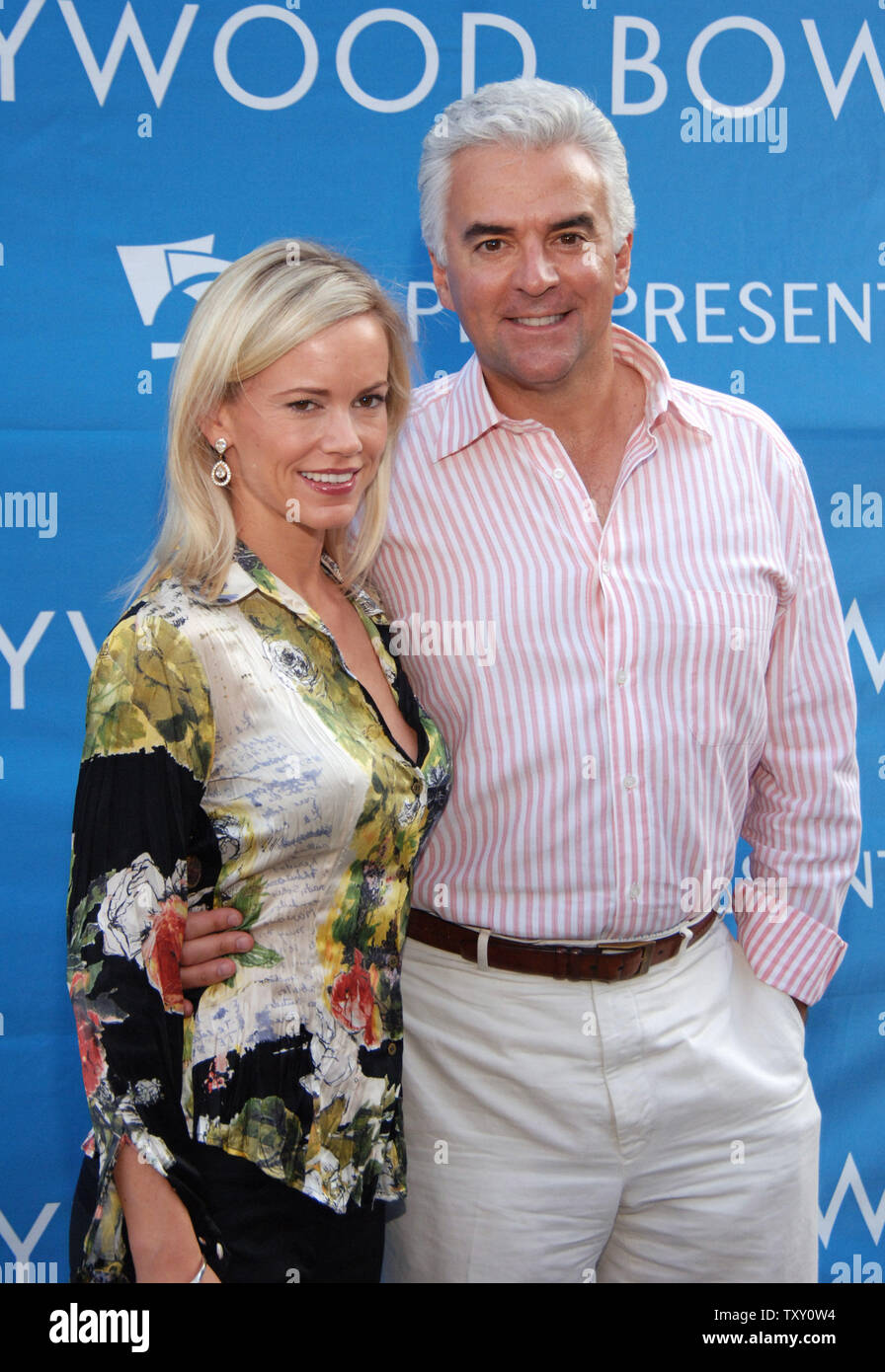 Actor John O'Hurley (R) and wife Lisa arrive for a performance by Yo-Yo Ma  and the Silk Road Ensemble at KCRW's World Festival at the Hollywood Bowl  on August 7, 2005 . (