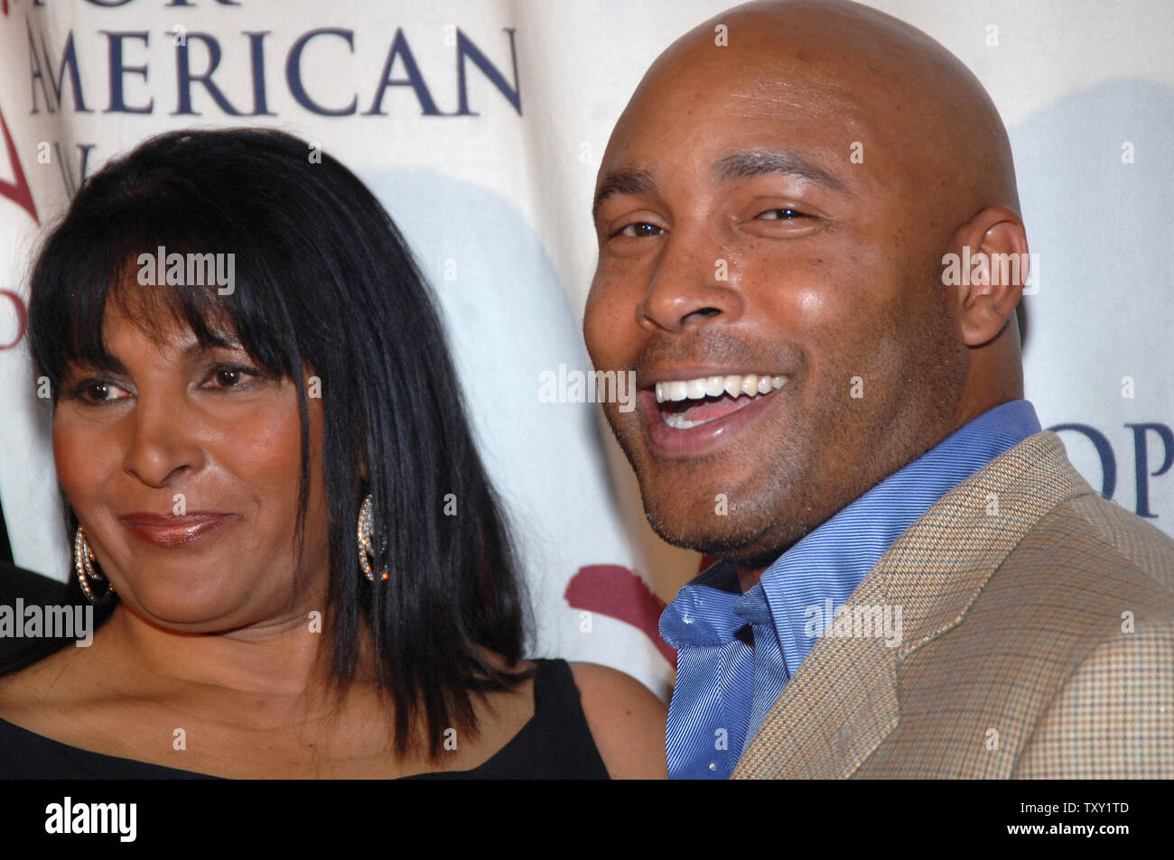 Actress Pam Grier (L) and actor Mathew St.Patrick arrive for the 16th annual Los Angeles Spirit of Liberty Celebration by the People for the American Way Foundation held at the Beverly Hilton September 26, 2005 . (UPI Photo/ Phil McCarten) Stock Photo