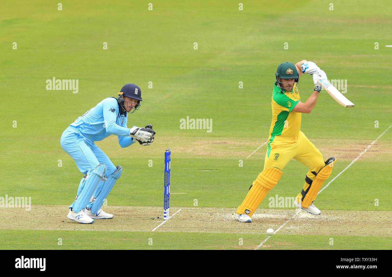 London, UK. 25th June, 2019. Aaron Finch of Australia plays a shot as wicketkeeper Jos Buttler of England looks on during the England v Australia, ICC Cricket World Cup match, at Lords, London, England. Credit: Cal Sport Media/Alamy Live News Stock Photo