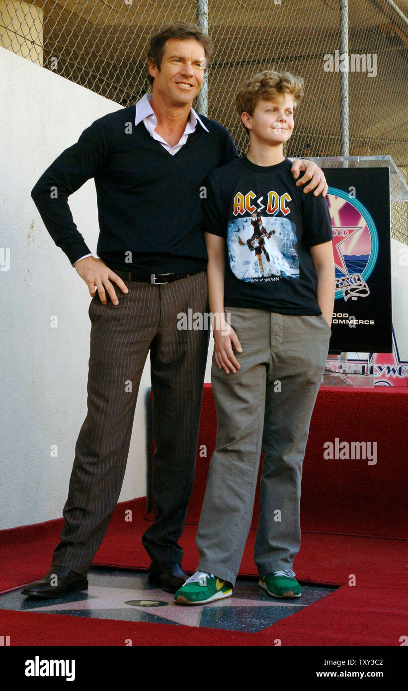 Actor Dennis Quaid (L), star of the upcoming holiday family comedy 'Yours, Mine and Ours' and son Jack smile for photographers during an unveiling ceremony honoring Quaid with the 2,295th star on the Hollywood Walk of Fame in Los Angeles, California  November 16, 2005.   (UPI Photo/Jim Ruymen) Stock Photo