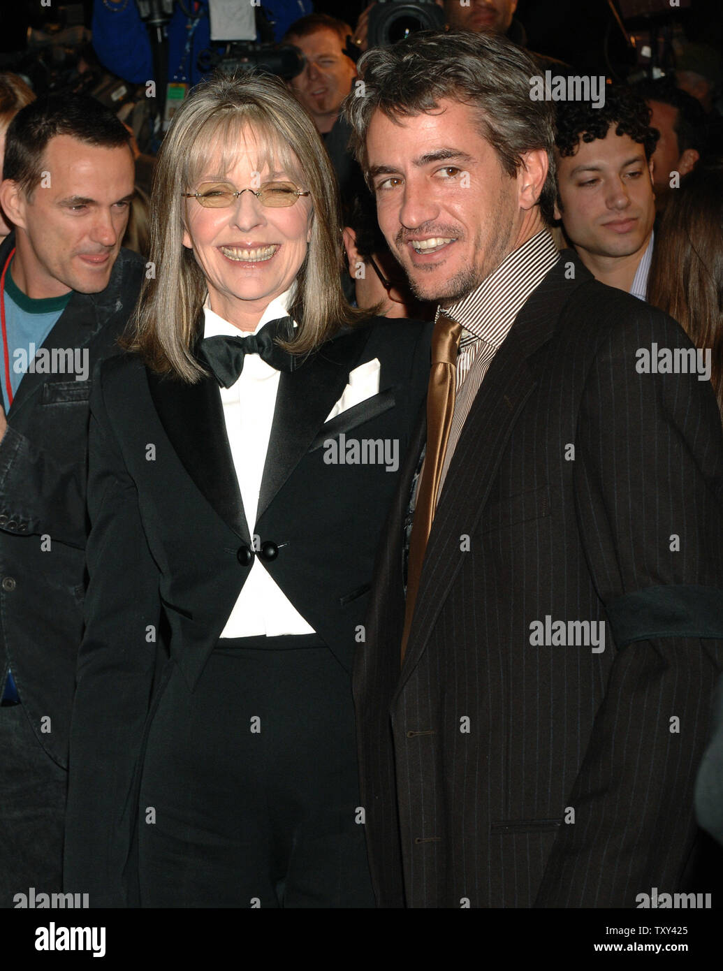 Actress Diane Keaton (L) and actor Dermot Mulroney smile as they arrive for the premiere of their new film "The Family Stone" in Los Angeles December 6, 2005. The film, a comic story about the annual holiday gathering of a New England family, also stars Rachel McAdams, Claire Danes, Sarah Jessica Parker and Craig T. Nelson and opens in the U.S. on December 16. (UPI Photo/Jim Ruymen) Stock Photo